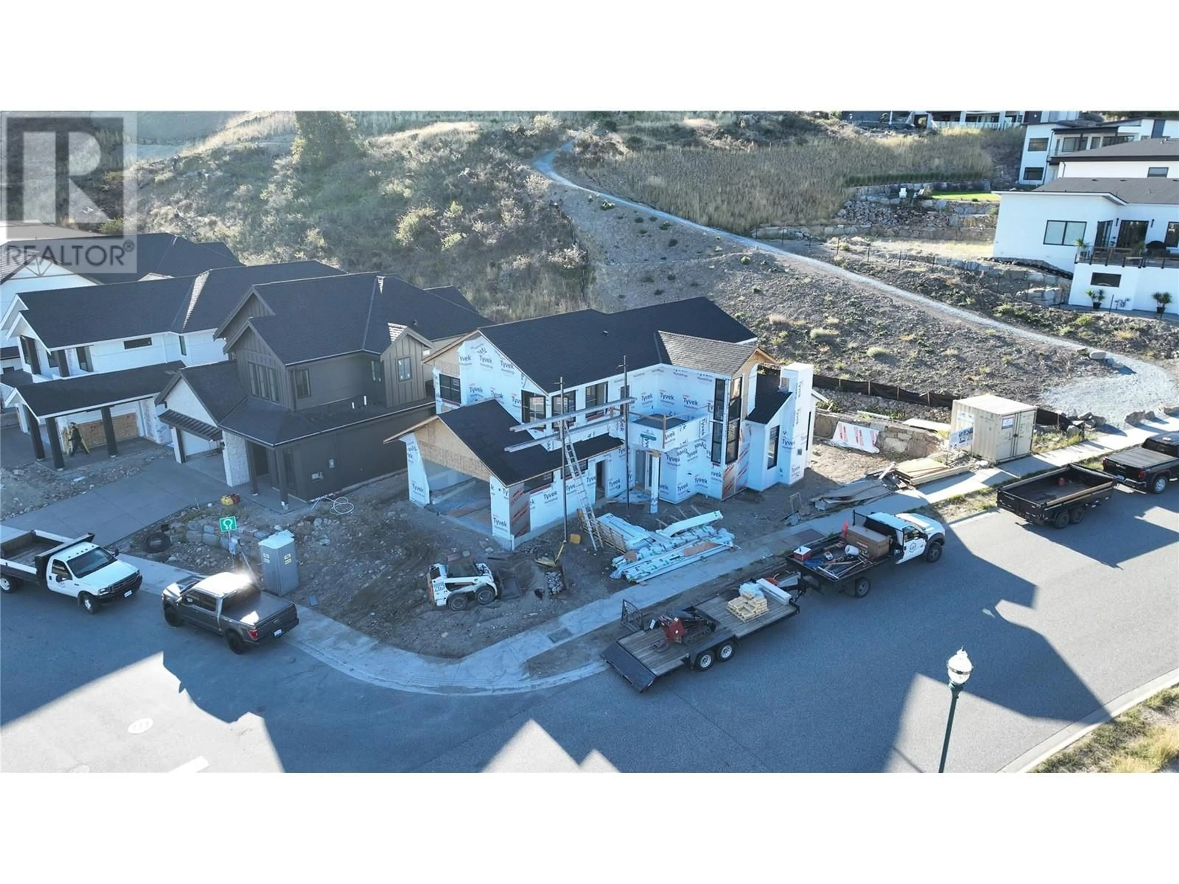 Frontside or backside of a home, the street view for 5557 Foothill Court, Kelowna British Columbia V1W5A8