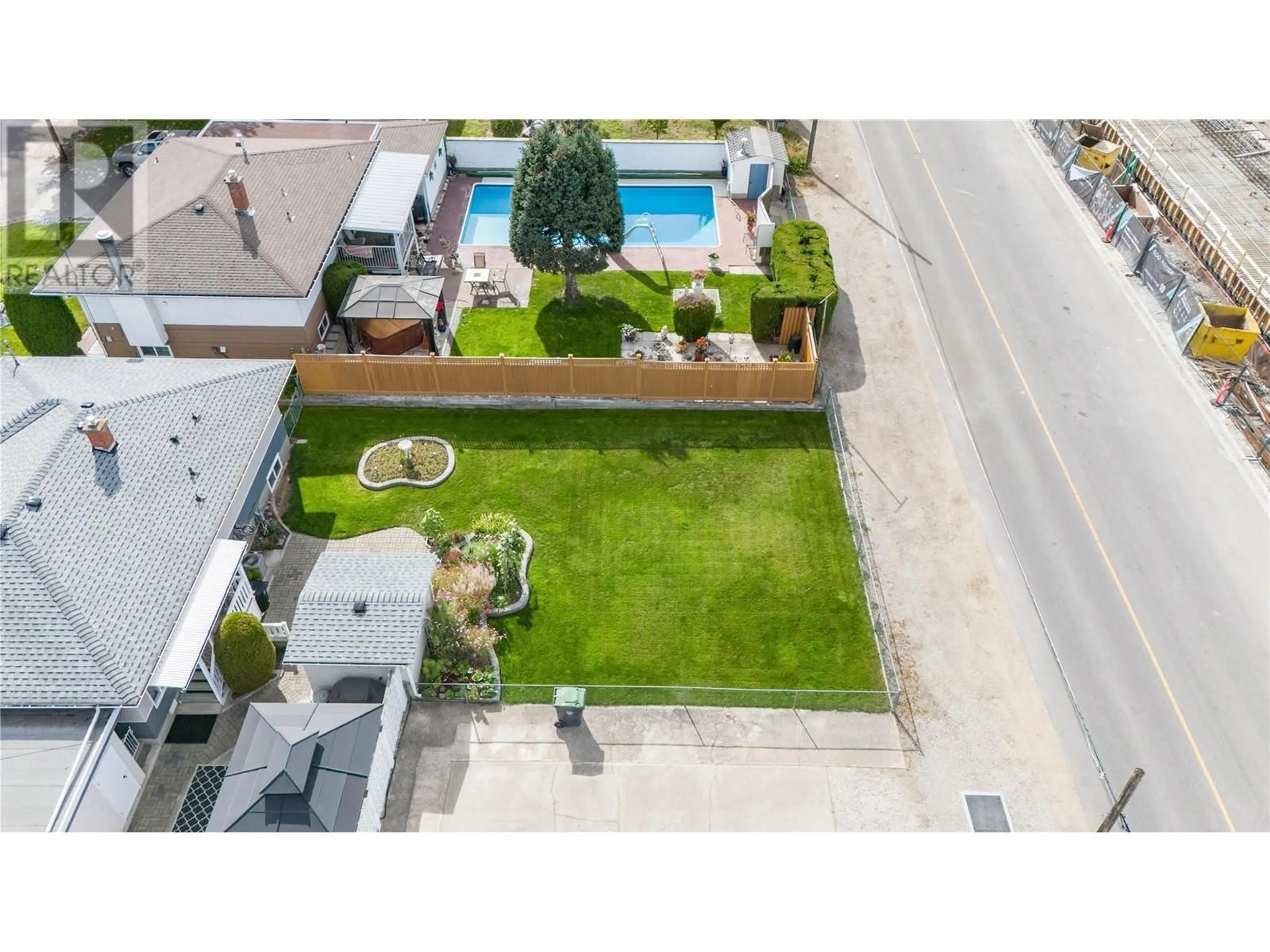 A pic from outside/outdoor area/front of a property/back of a property/a pic from drone, street for 500 Mcdonald Road, Kelowna British Columbia V1X3H2