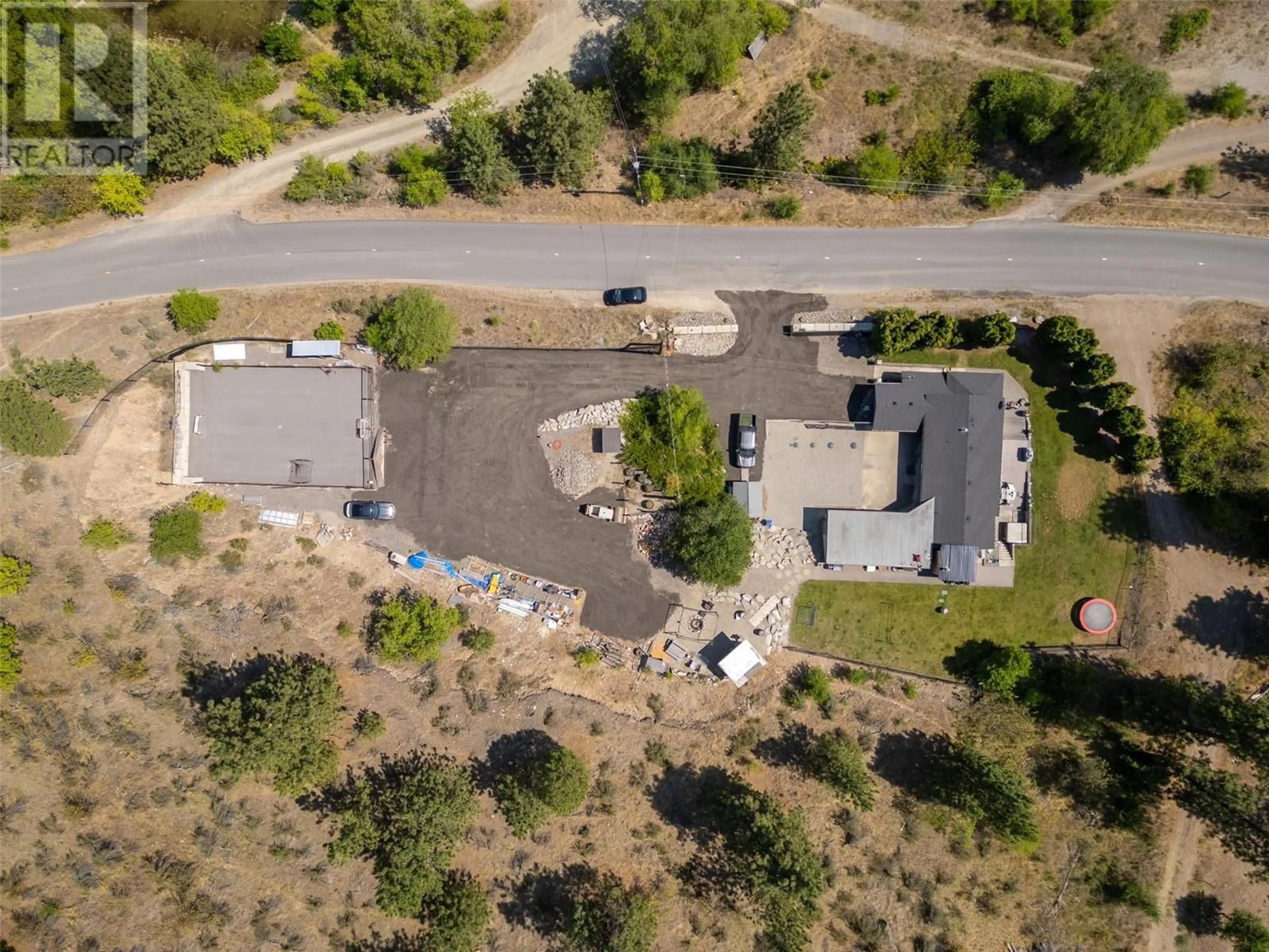 Frontside or backside of a home, the front or back of building for 1400 Green Lake Road, Okanagan Falls British Columbia V0H1R0