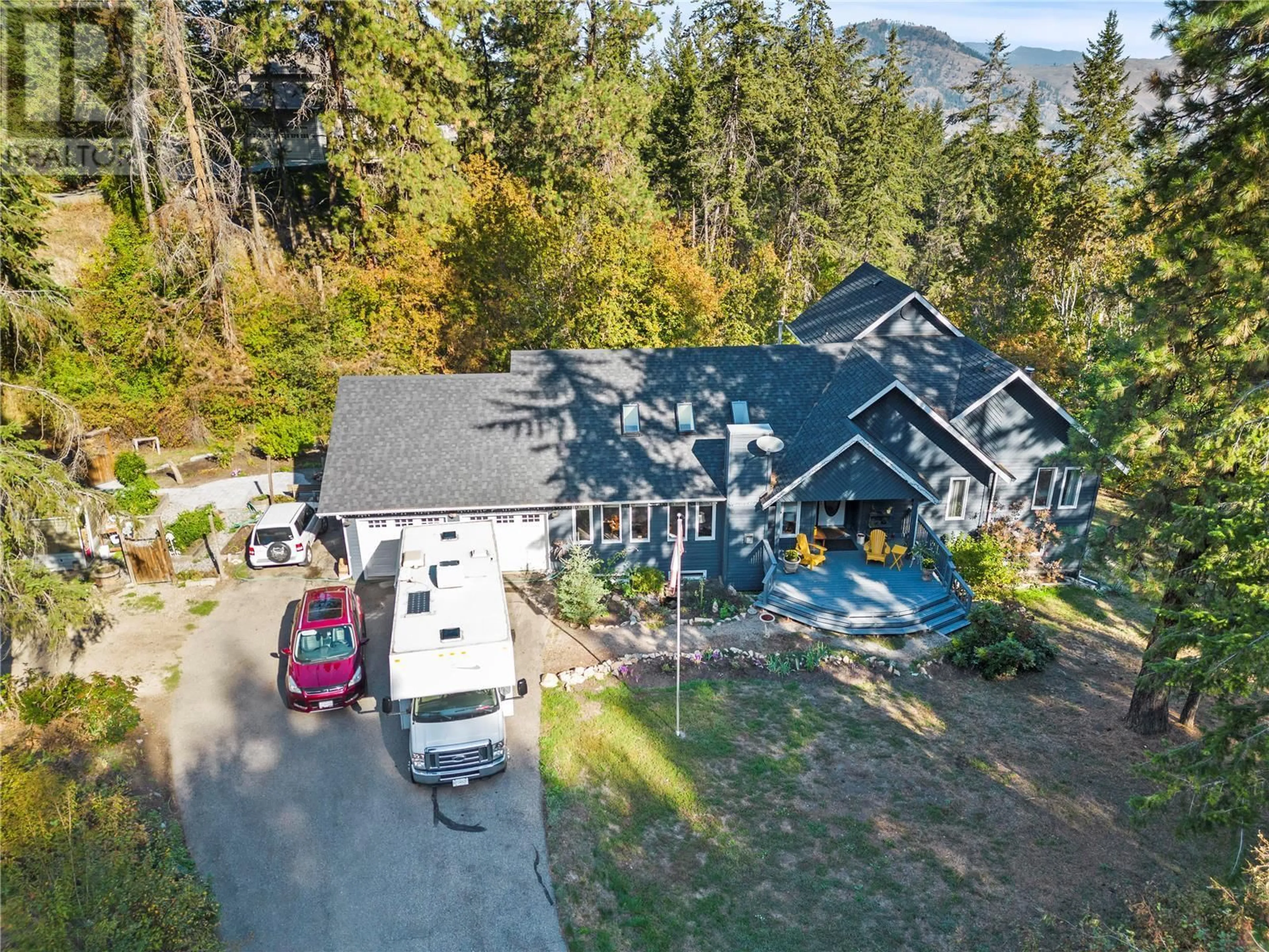 A pic from outside/outdoor area/front of a property/back of a property/a pic from drone, mountain view for 9292 KOKANEE ROAD, Vernon British Columbia V1H1K4