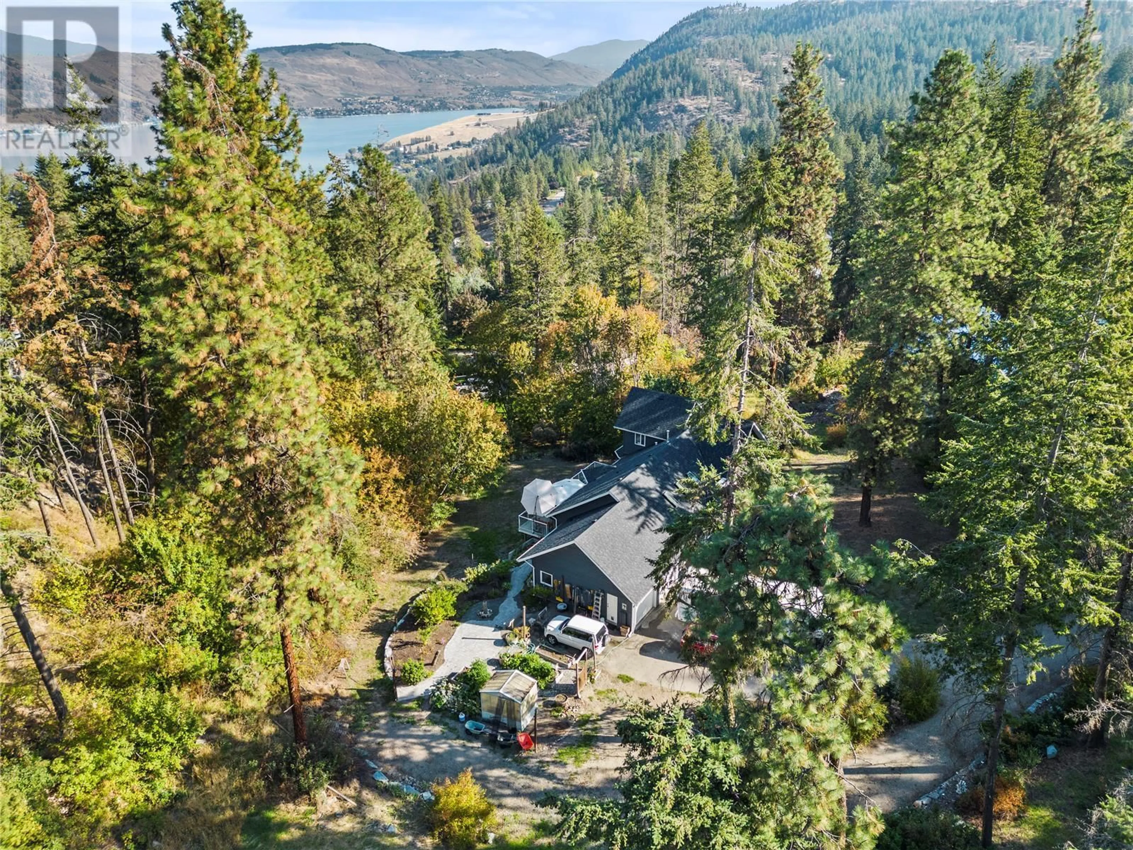 A pic from outside/outdoor area/front of a property/back of a property/a pic from drone, water/lake/river/ocean view for 9292 KOKANEE ROAD, Vernon British Columbia V1H1K4