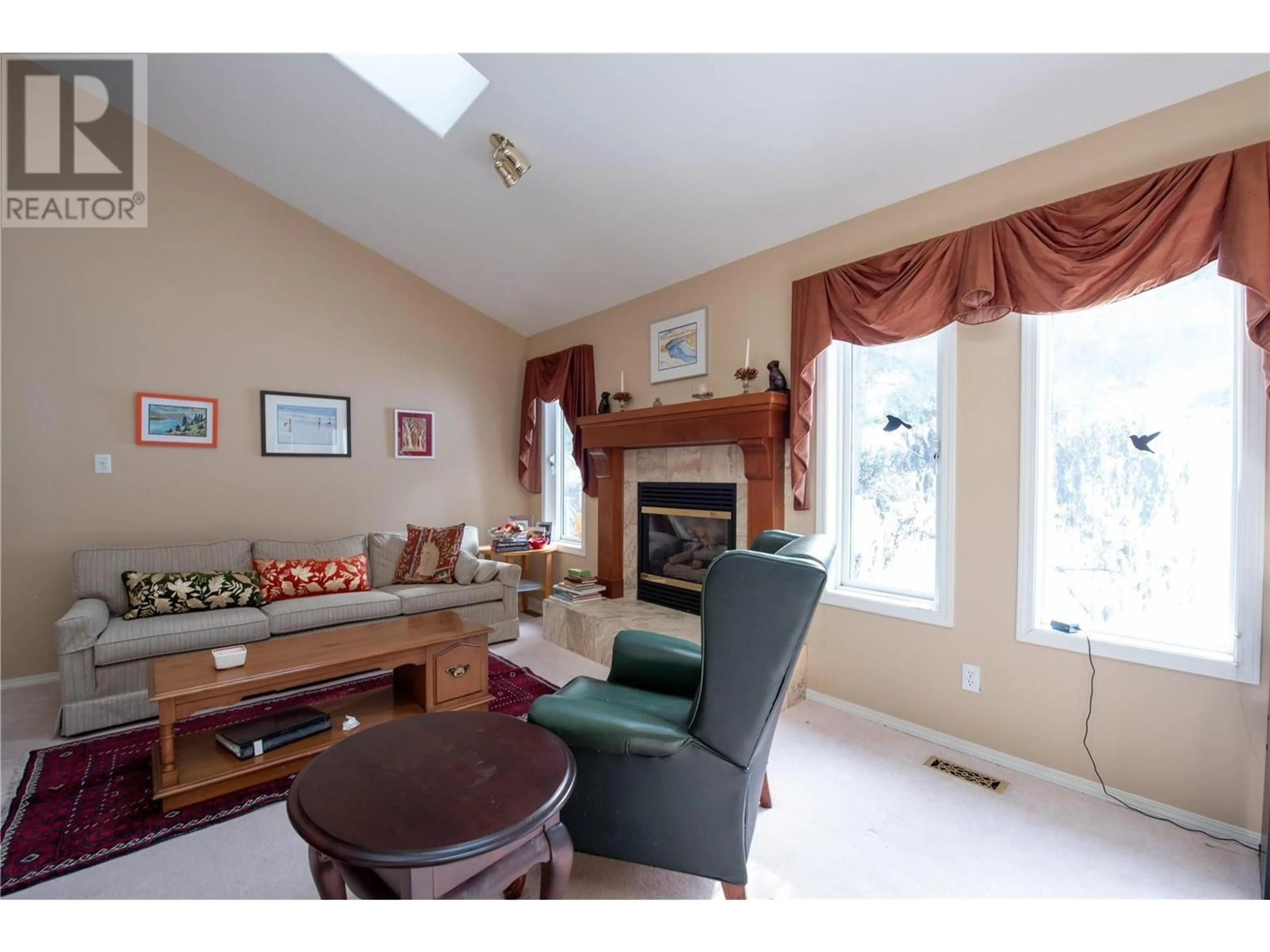 Living room with furniture, unknown for 9292 KOKANEE ROAD, Vernon British Columbia V1H1K4