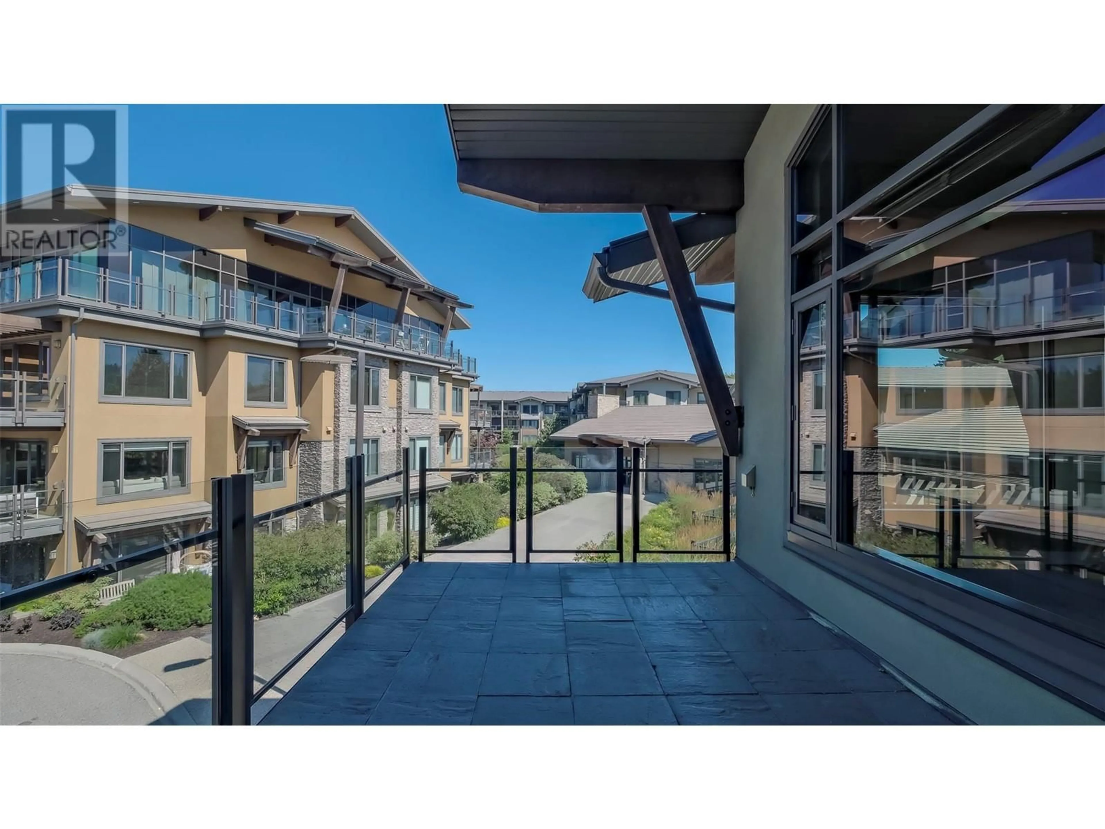 A pic from exterior of the house or condo for 600 Sarsons Road Unit# 202, Kelowna British Columbia V1W5H5