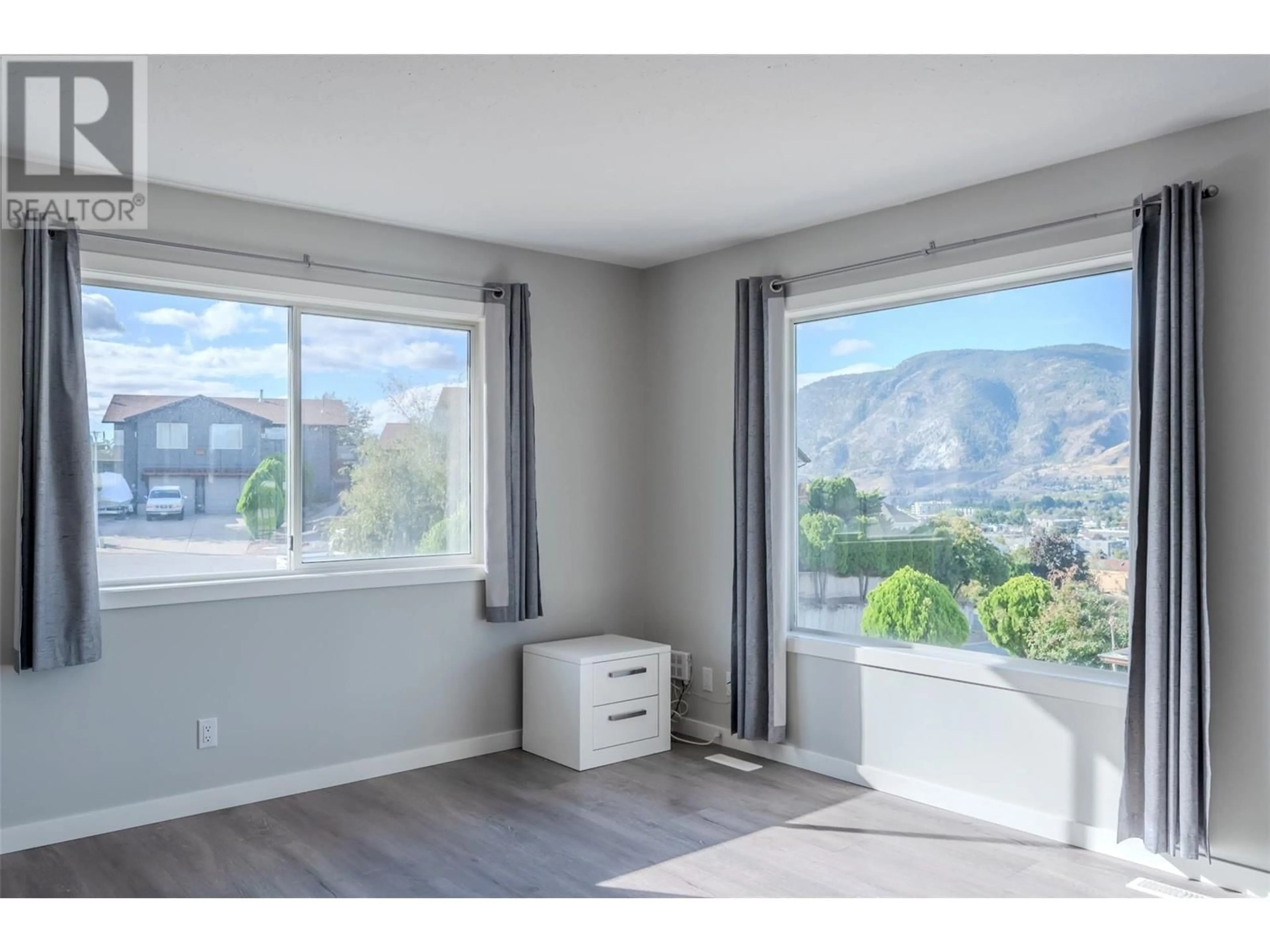 A pic of a room, wood floors for 217 GREENWOOD Drive, Penticton British Columbia V2A7P9