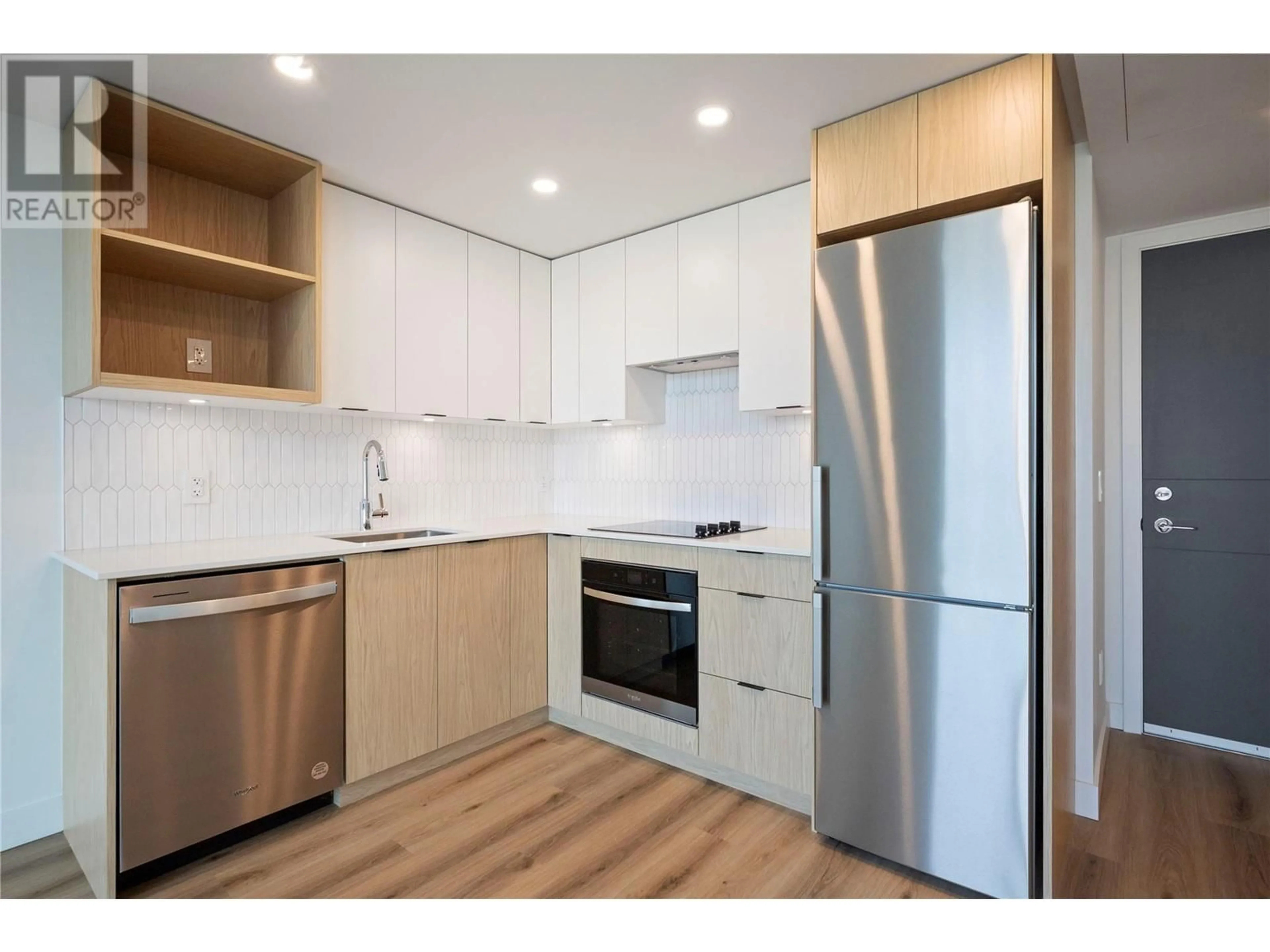 Standard kitchen, wood floors for 1488 Bertram Street Unit# 609, Kelowna British Columbia V1Y6P2