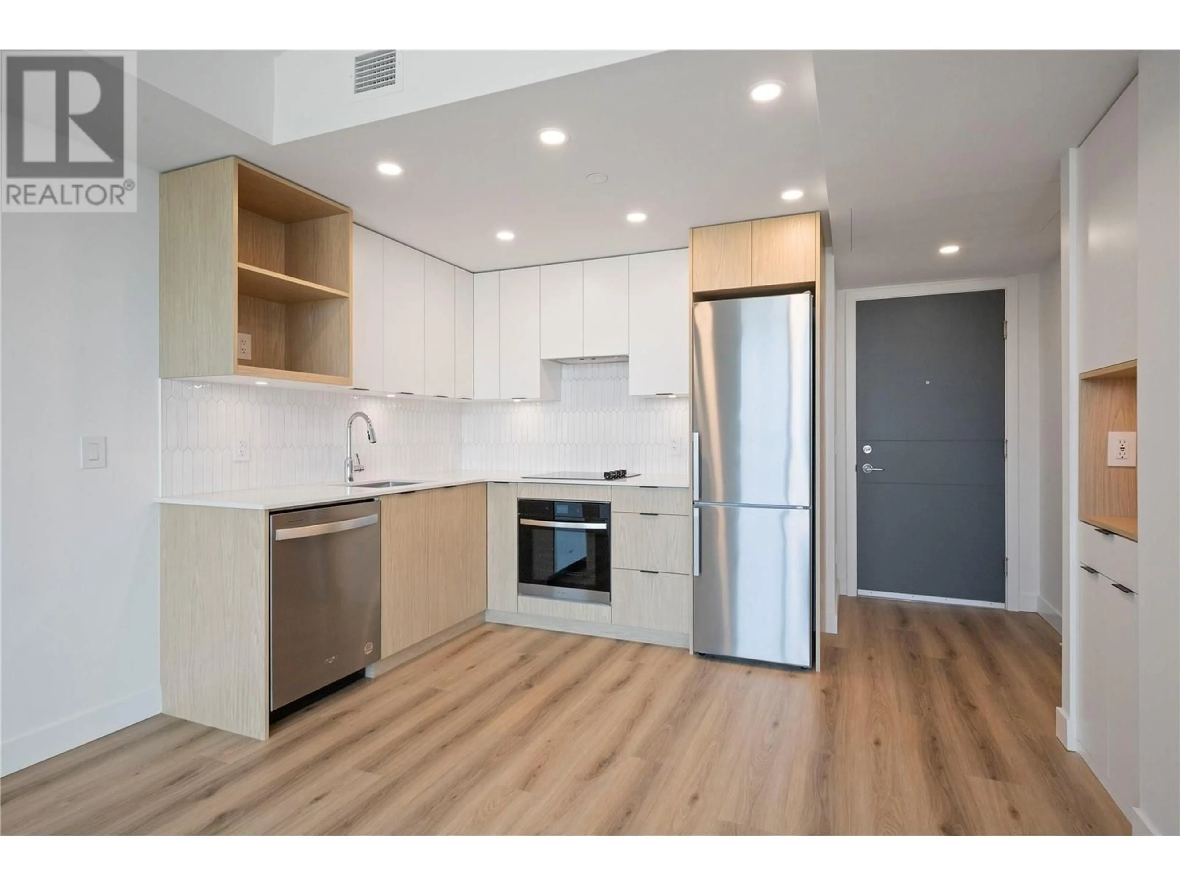 Standard kitchen, wood floors for 1488 Bertram Street Unit# 609, Kelowna British Columbia V1Y6P2