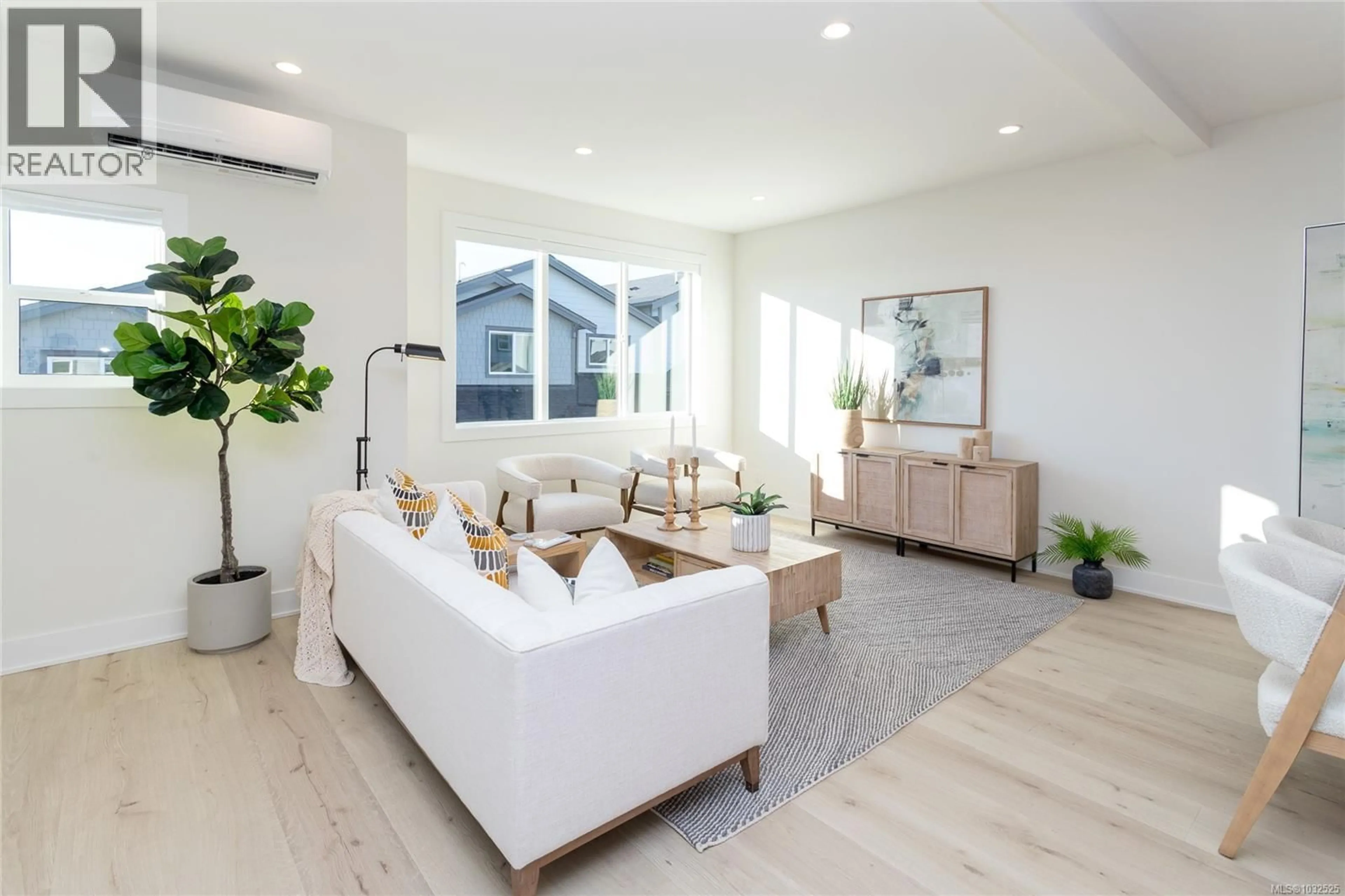 Living room with furniture, wood/laminate floor for 1417 DOLOMITE RIDGE, Langford British Columbia V9B7G1