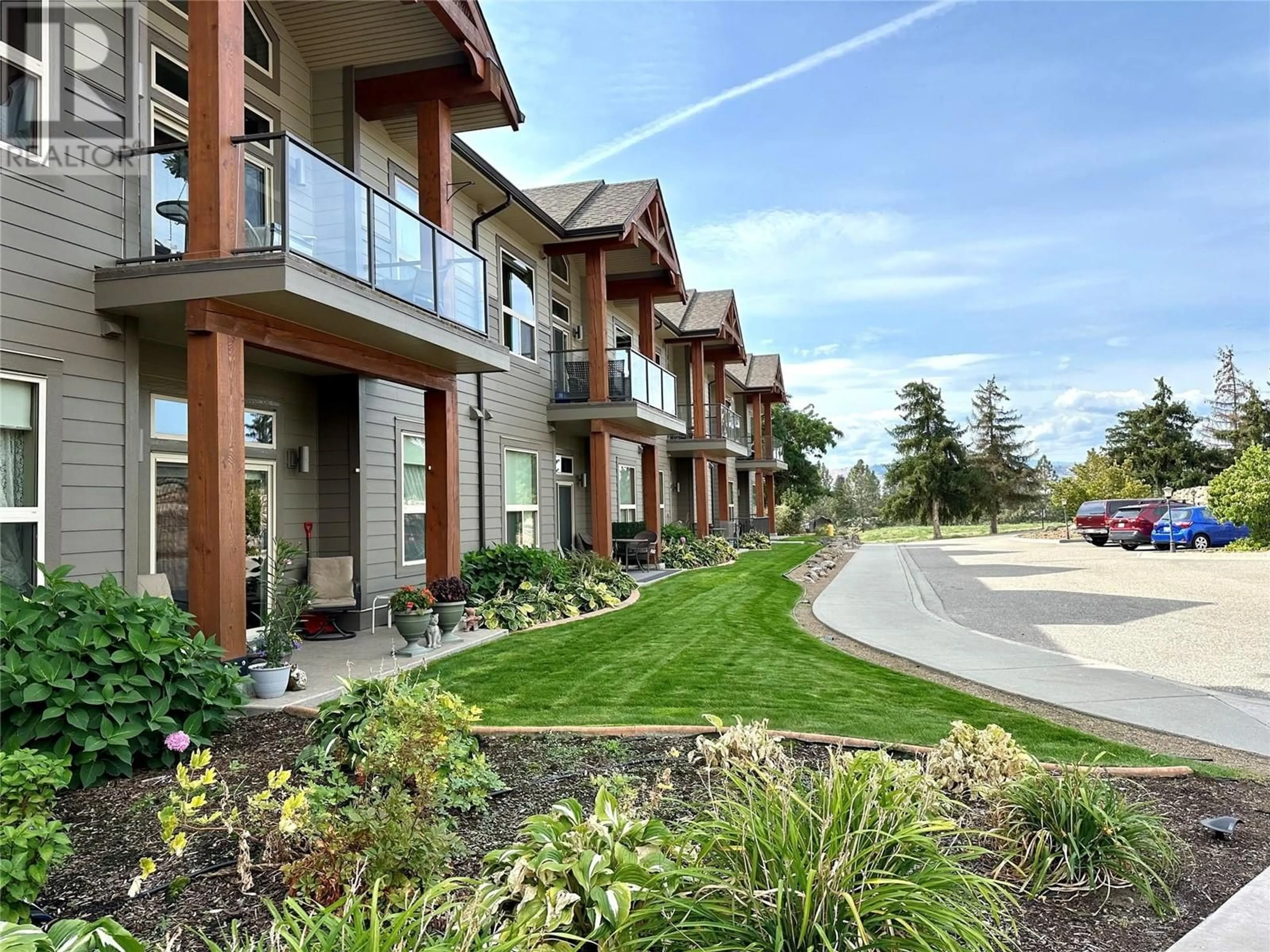 A pic from exterior of the house or condo, the street view for 9100 Mackie Drive Unit# 101, Coldstream British Columbia V1B1G9