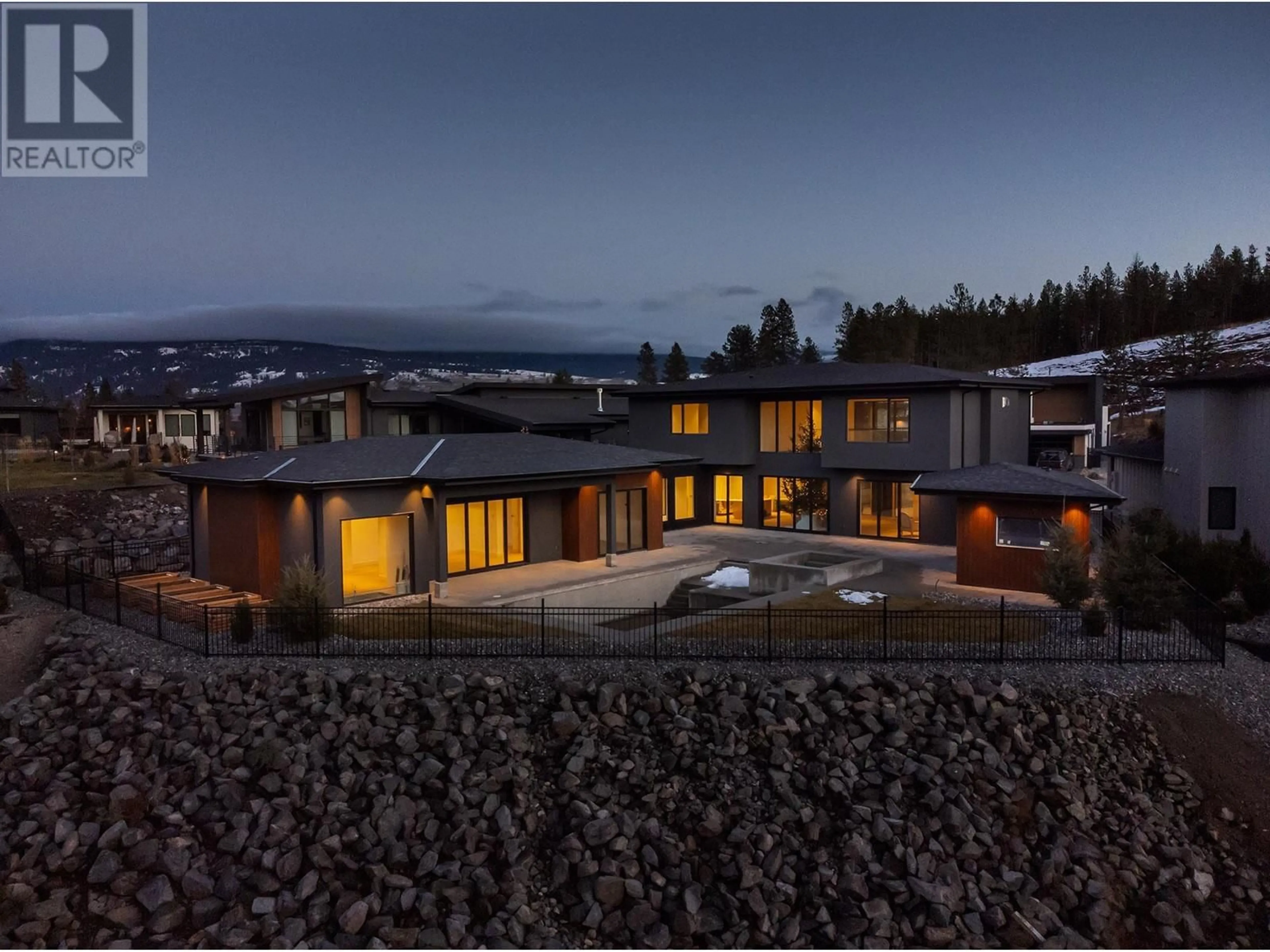 A pic from outside/outdoor area/front of a property/back of a property/a pic from drone, mountain view for 10248 Beacon Hill Drive, Lake Country British Columbia V4V1P3