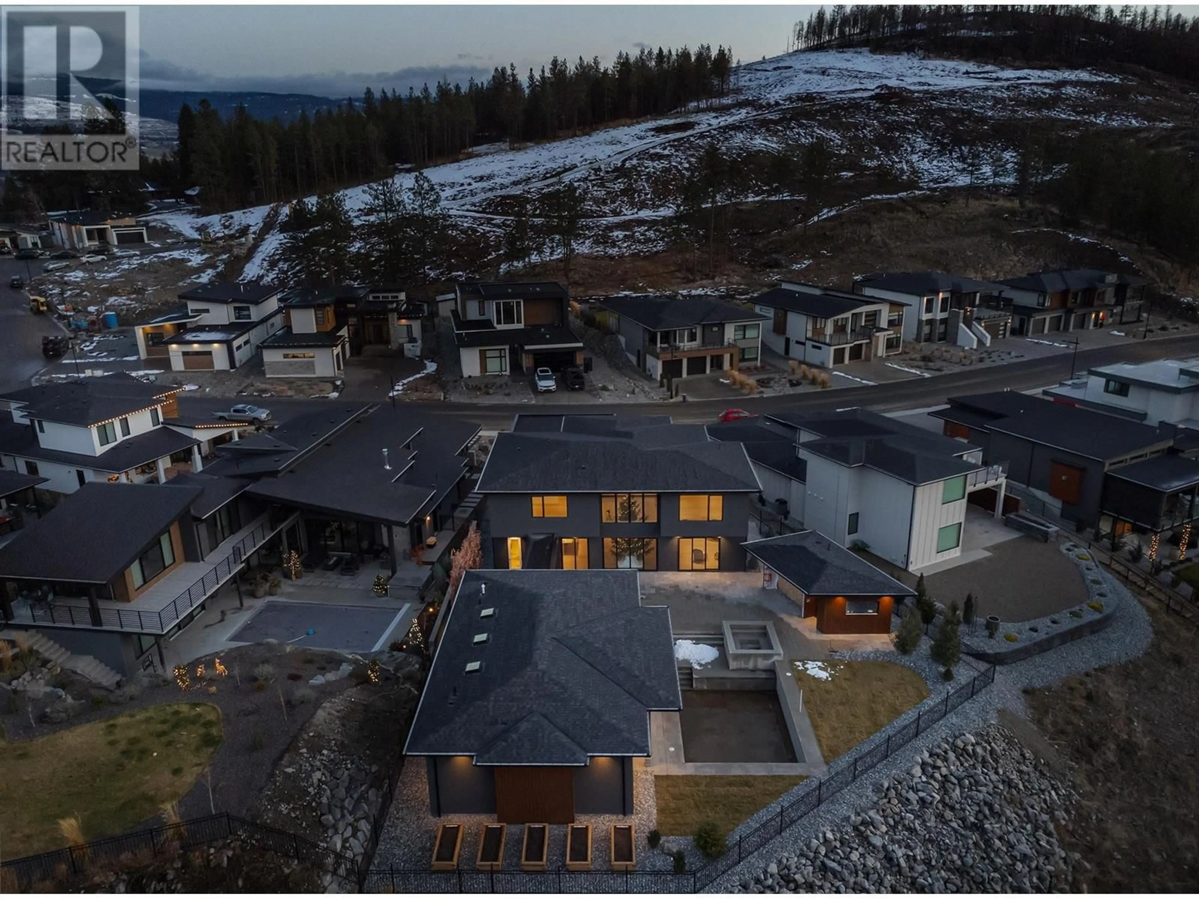 A pic from outside/outdoor area/front of a property/back of a property/a pic from drone, mountain view for 10248 Beacon Hill Drive, Lake Country British Columbia V4V1P3