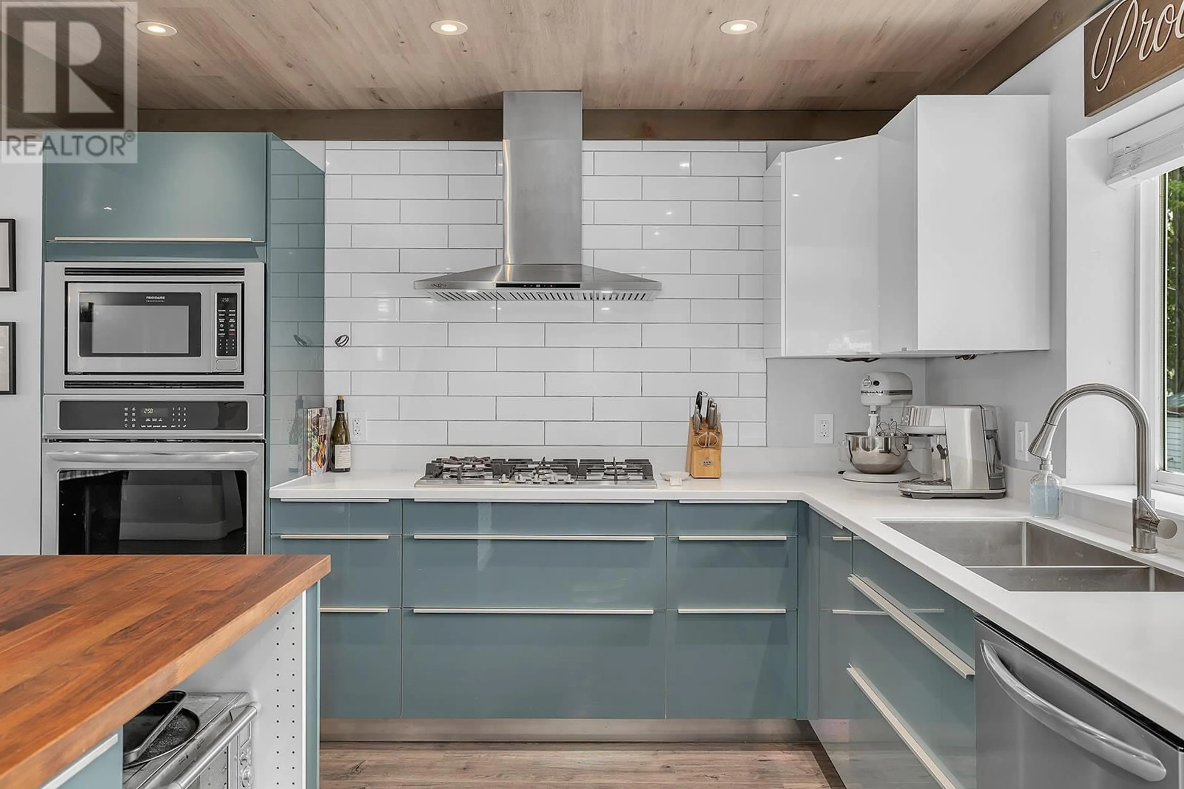 Contemporary kitchen, wood floors for 832 Walrod Street, Kelowna British Columbia V1Y2S3