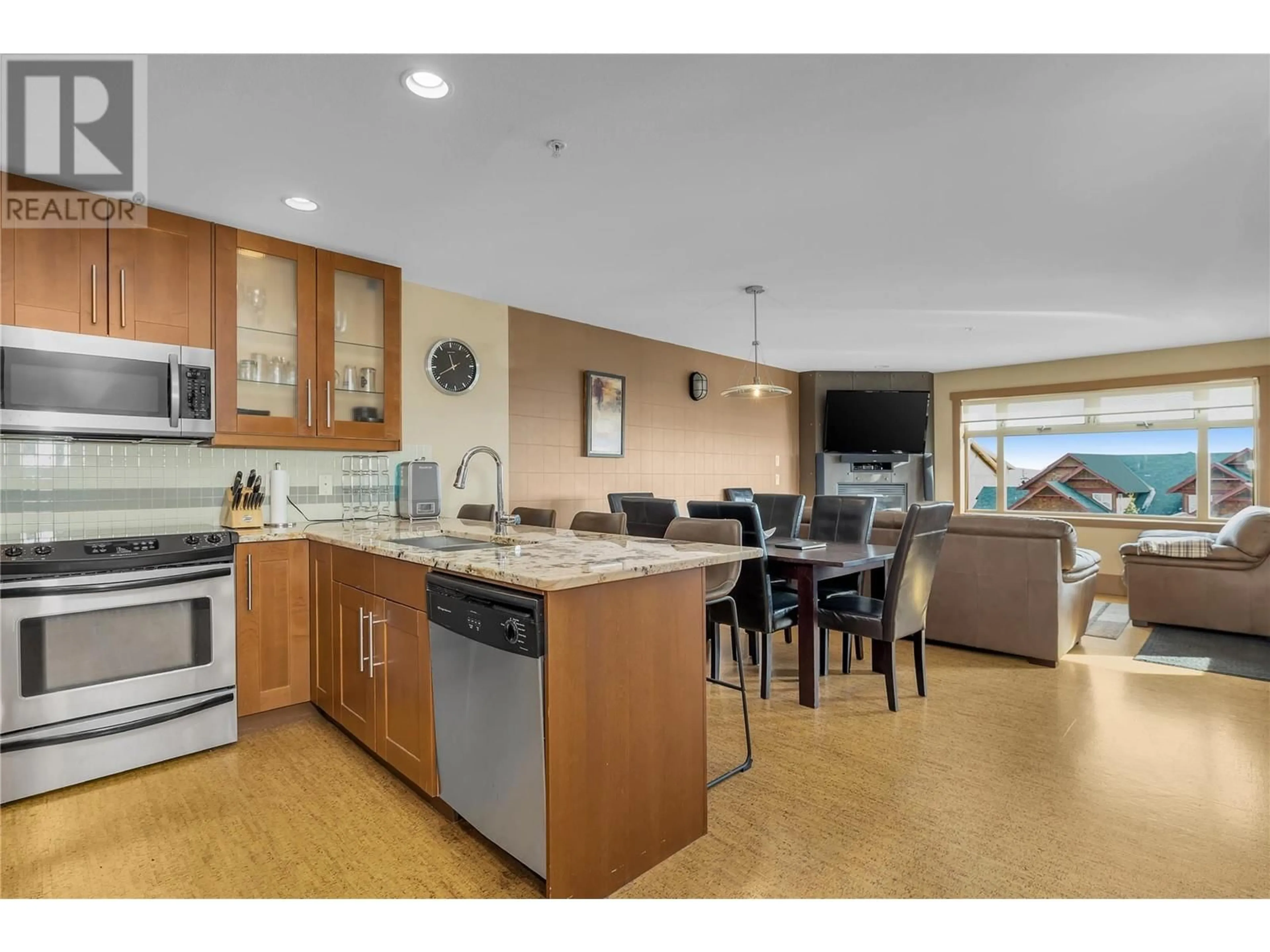 Open concept kitchen, ceramic/tile floor for 103 - 5030 SNOWBIRD WAY, Big White British Columbia V1P1P3