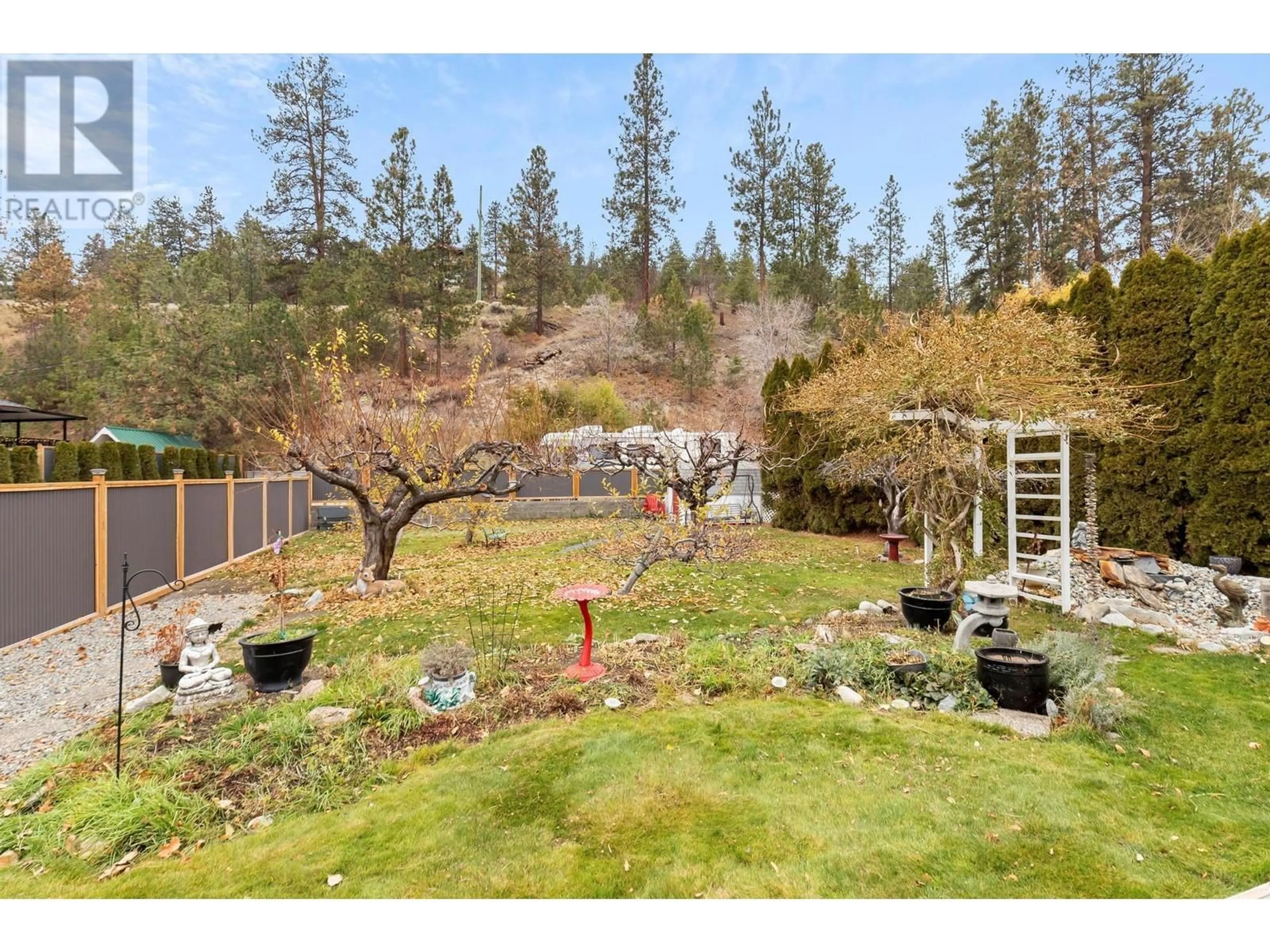 Patio, the fenced backyard for 3910 Beach Avenue, Peachland British Columbia V0H1X1