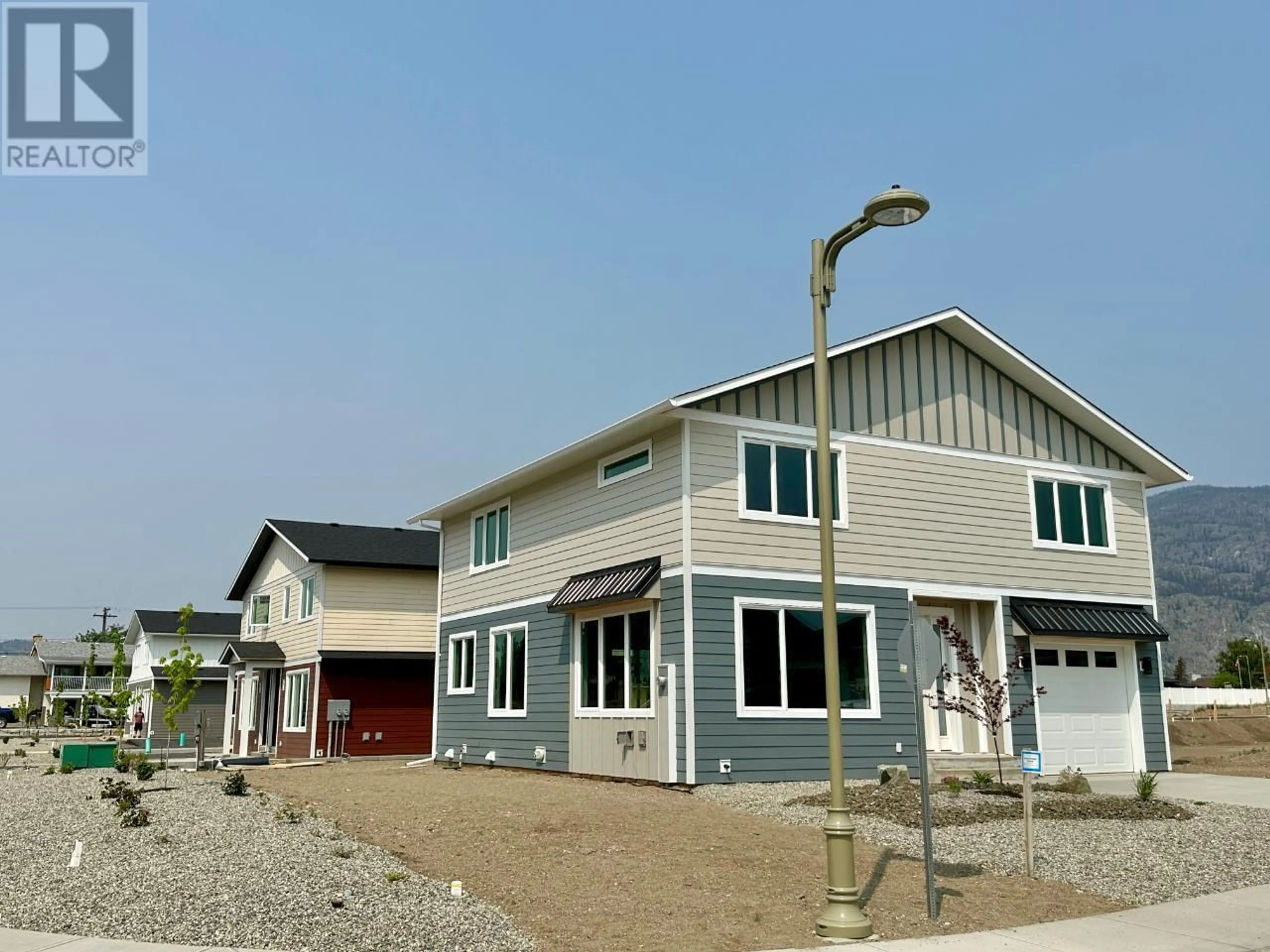 Frontside or backside of a home, the front or back of building for 2 Wood Duck Way, Osoyoos British Columbia V0H1V5