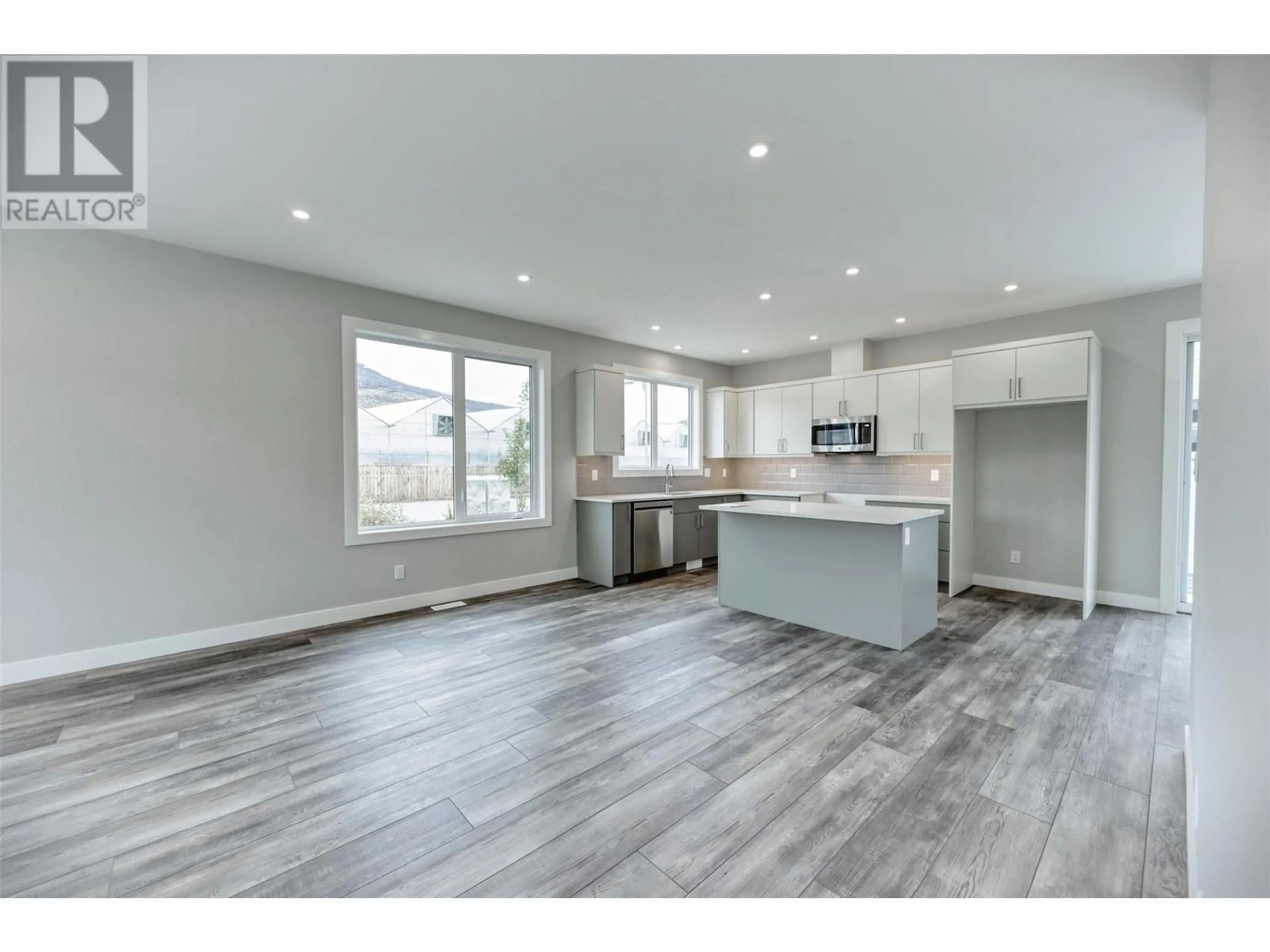 Open concept kitchen for 2 Wood Duck Way, Osoyoos British Columbia V0H1V5