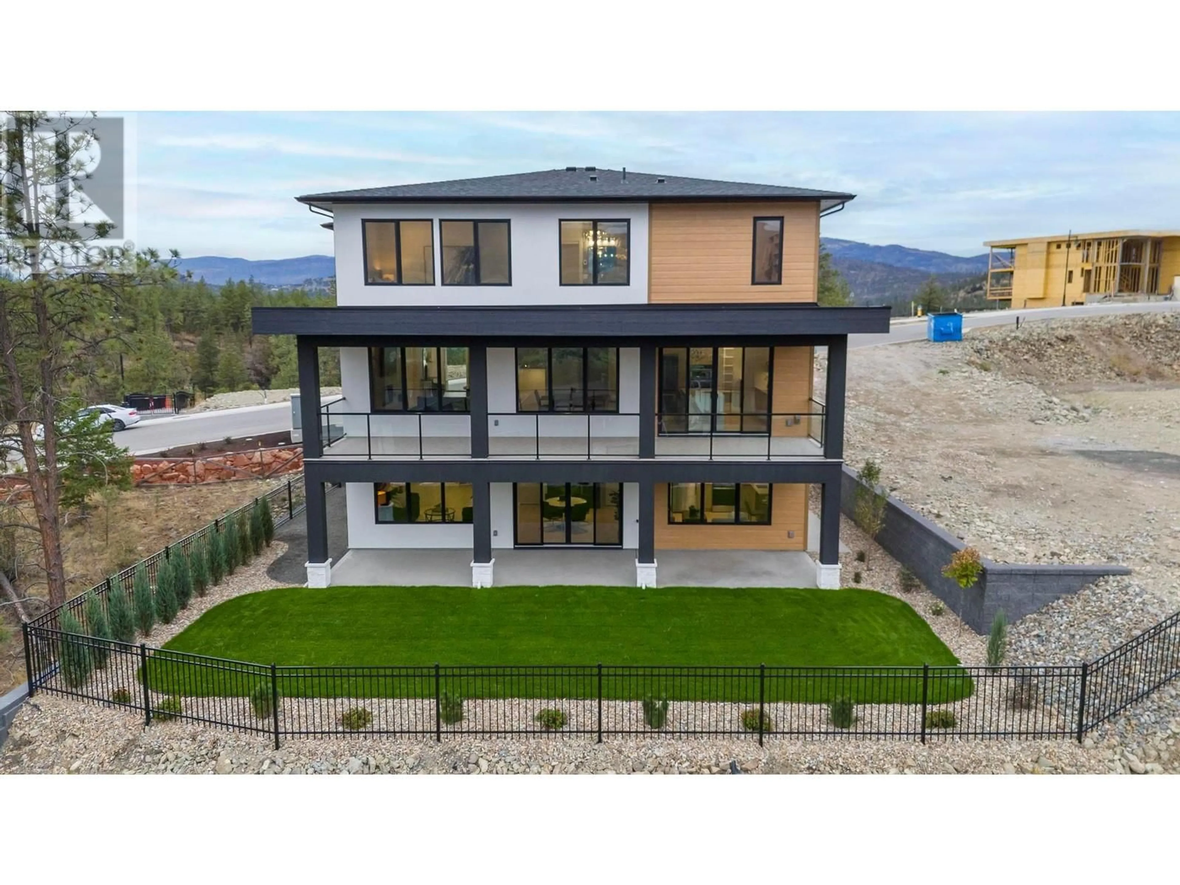 A pic from outside/outdoor area/front of a property/back of a property/a pic from drone, unknown for 615 KINGSWOOD TERRACE, Kelowna British Columbia V1V0J2