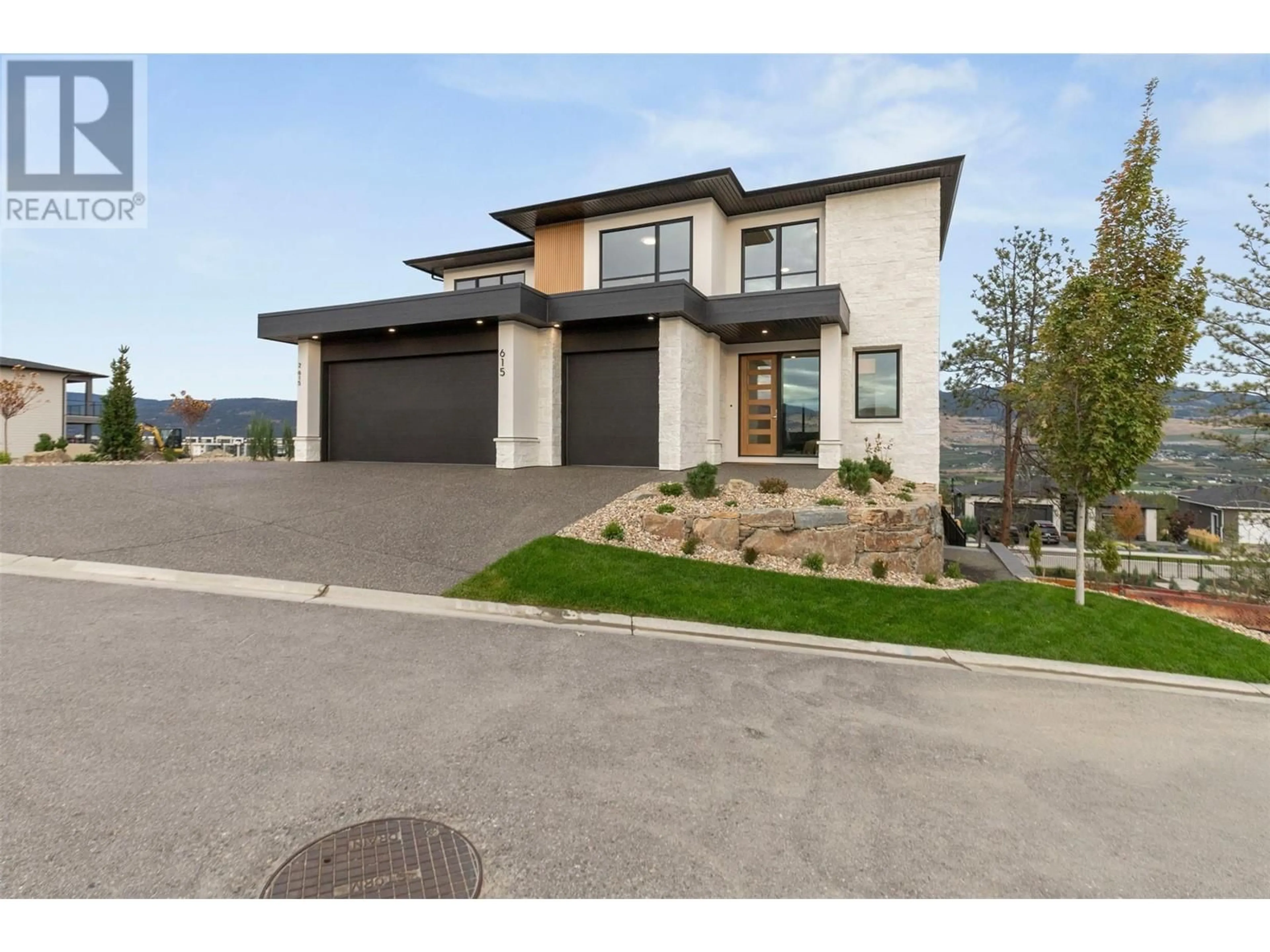 Home with brick exterior material, street for 615 KINGSWOOD TERRACE, Kelowna British Columbia V1V0J2
