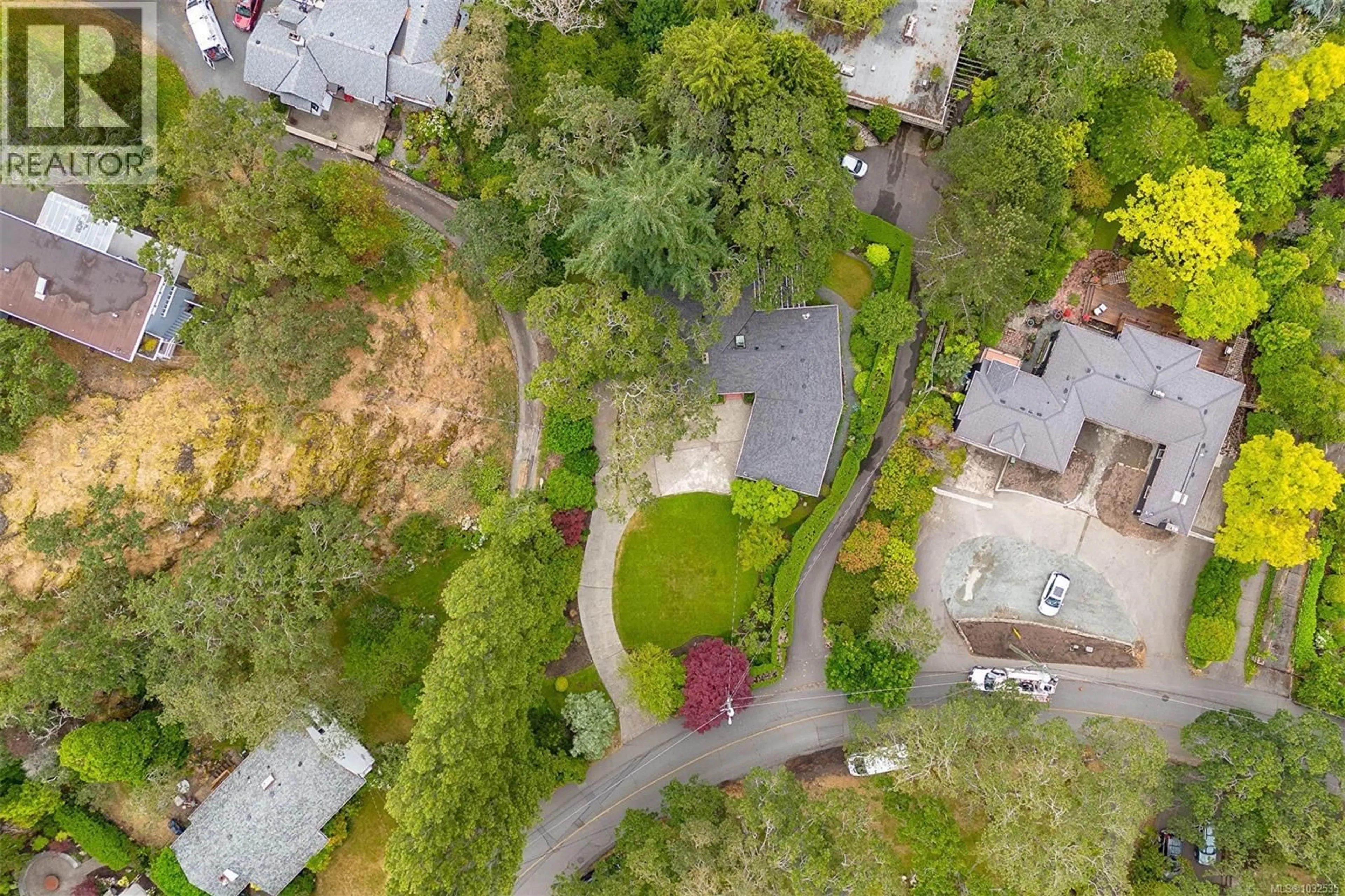 A pic from outside/outdoor area/front of a property/back of a property/a pic from drone, street for 1941 MAYFAIR DRIVE, Saanich British Columbia V8P1R1