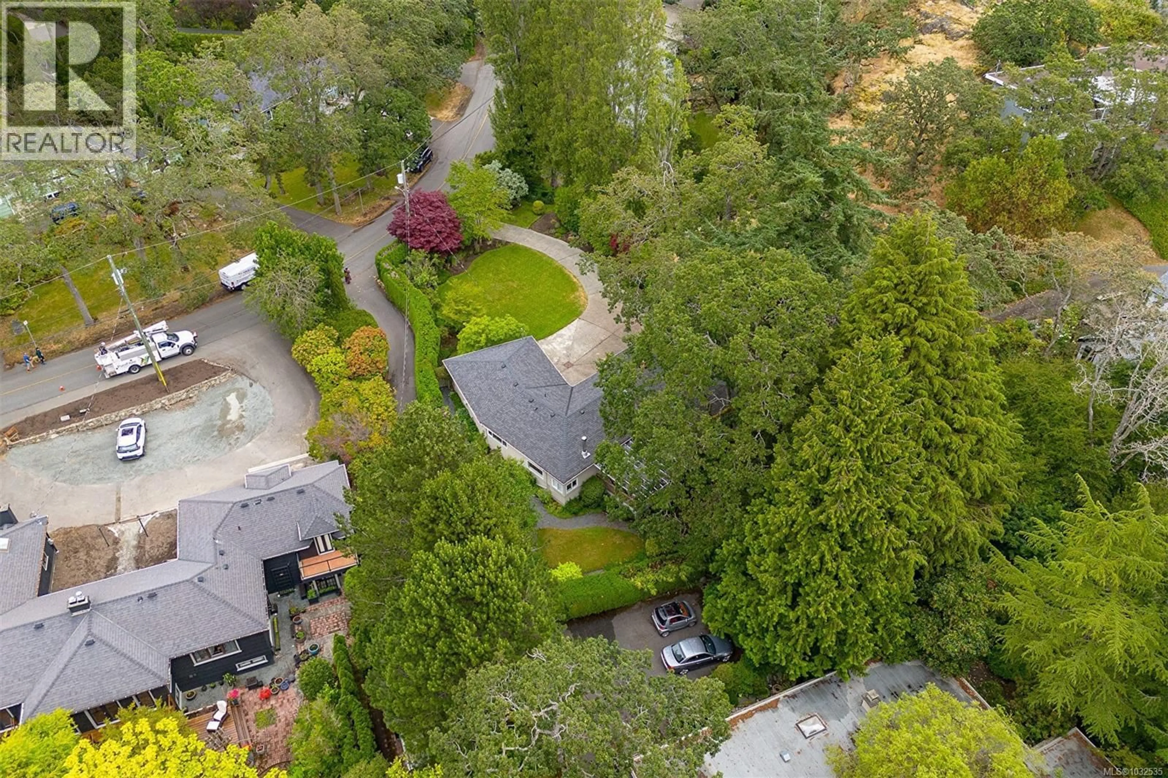 A pic from outside/outdoor area/front of a property/back of a property/a pic from drone, forest/trees view for 1941 MAYFAIR DRIVE, Saanich British Columbia V8P1R1