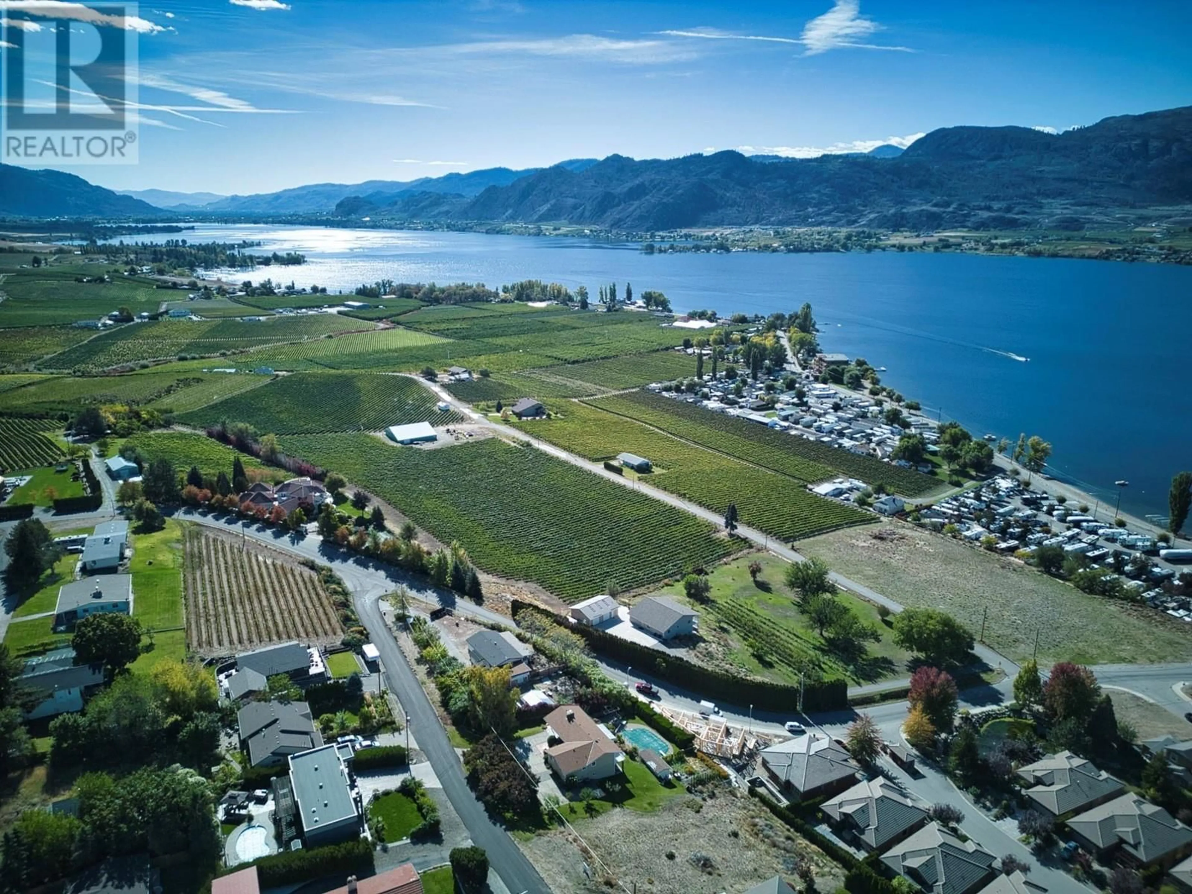 A pic from outside/outdoor area/front of a property/back of a property/a pic from drone, water/lake/river/ocean view for 3251 41ST STREET, Osoyoos British Columbia V0H1V6
