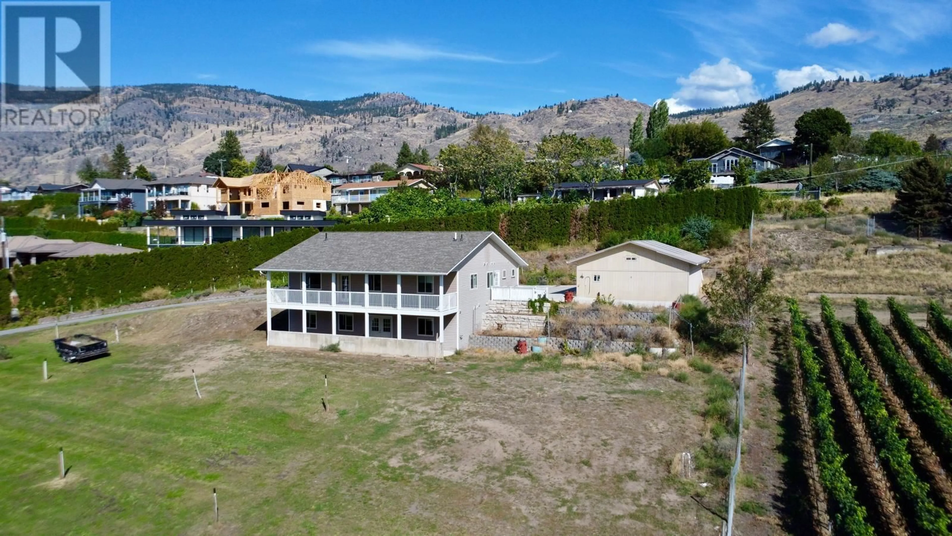 A pic from outside/outdoor area/front of a property/back of a property/a pic from drone, unknown for 3251 41ST STREET, Osoyoos British Columbia V0H1V6