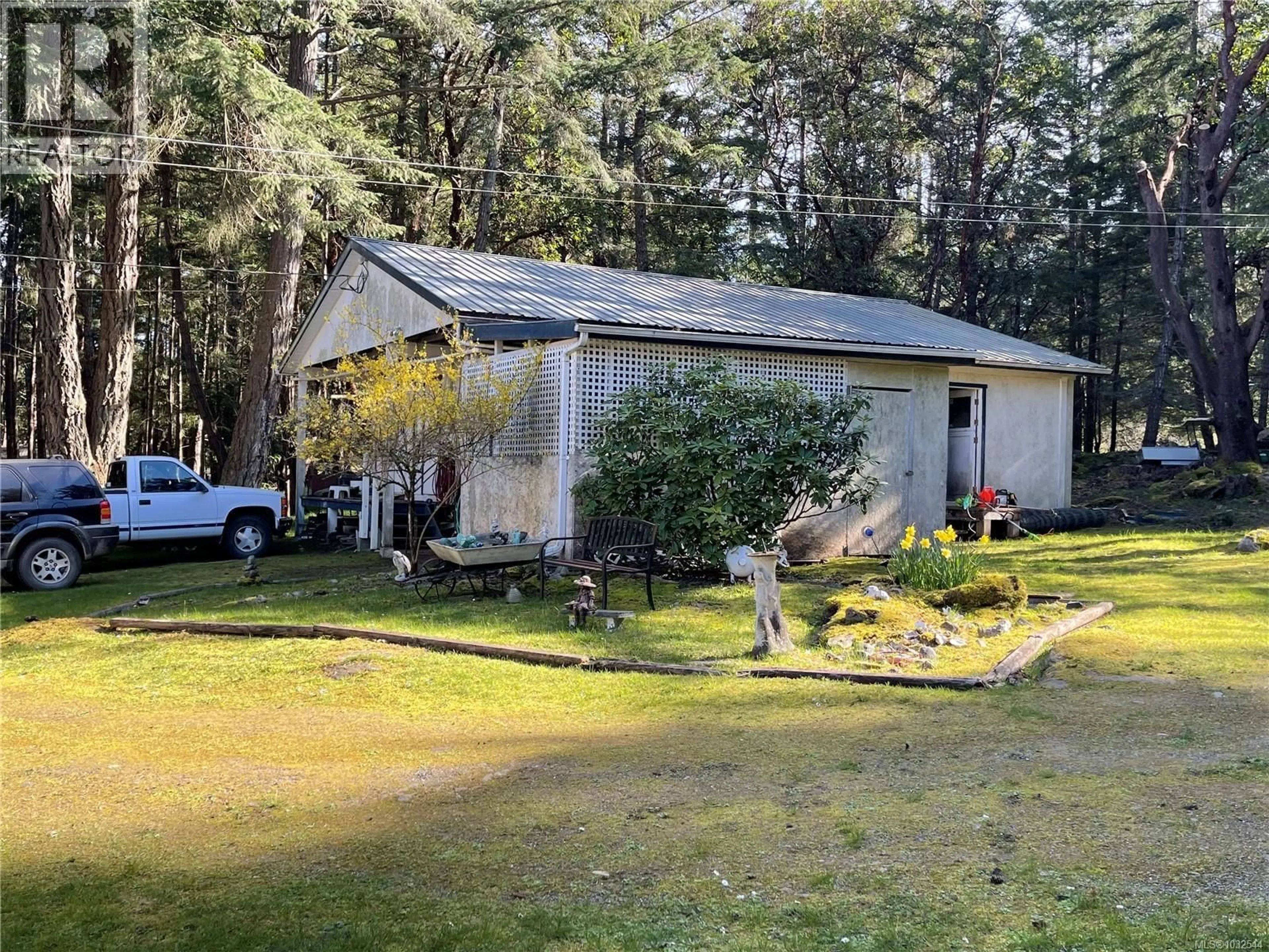 A pic from outside/outdoor area/front of a property/back of a property/a pic from drone, forest/trees view for 873 DRIFTWOOD DRIVE, Mudge Island British Columbia V0V0V0