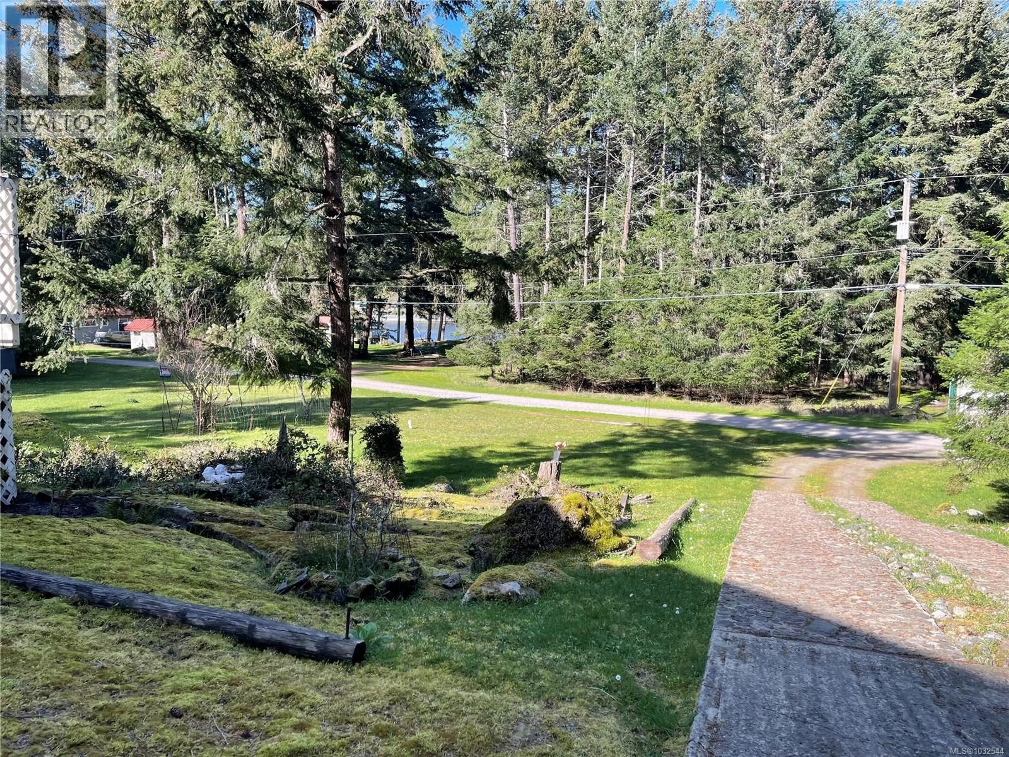 A pic from outside/outdoor area/front of a property/back of a property/a pic from drone, forest/trees view for 873 DRIFTWOOD DRIVE, Mudge Island British Columbia V0V0V0