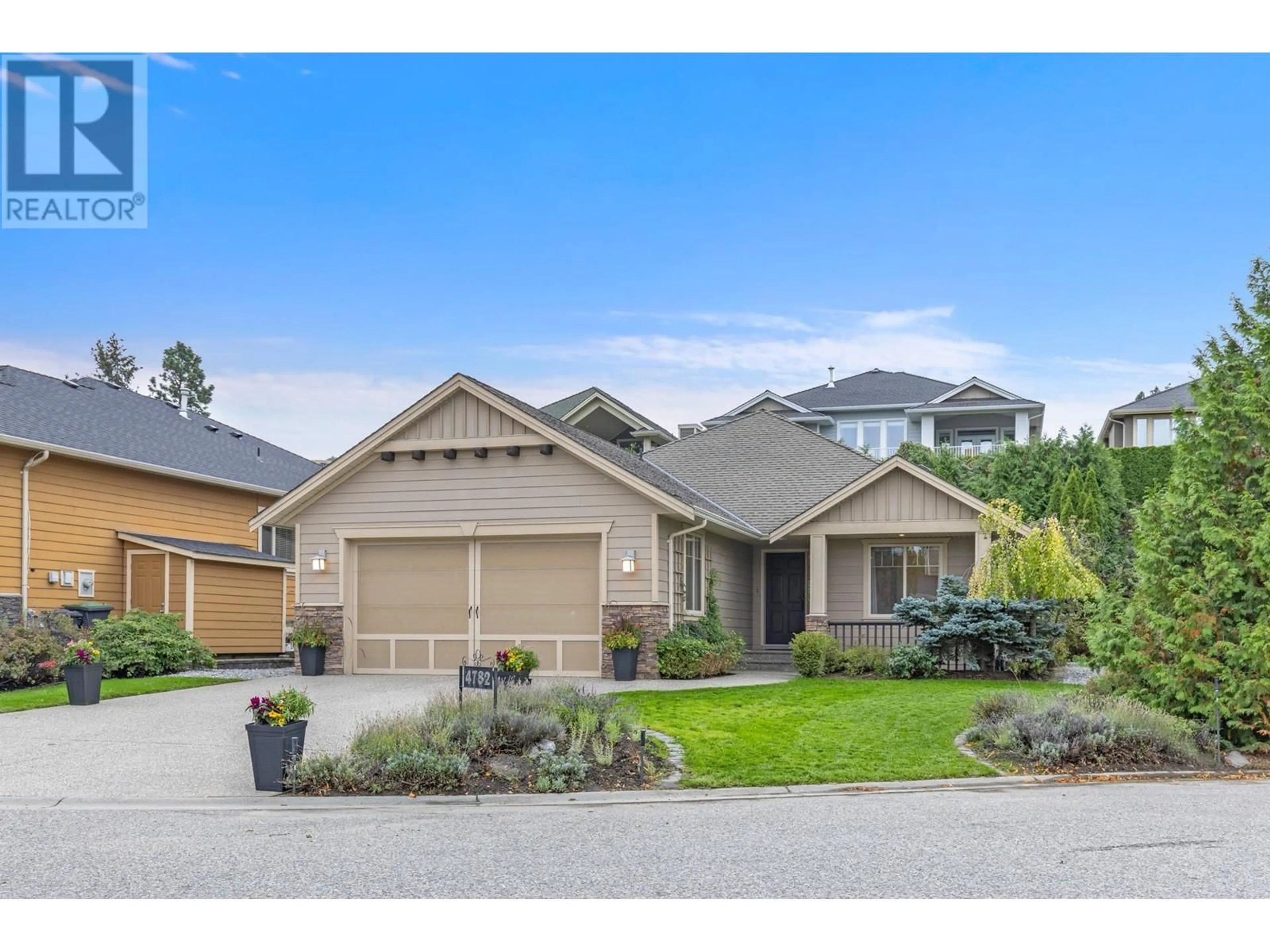 Frontside or backside of a home for 4782 Dillon Place, Kelowna British Columbia V1W5B3