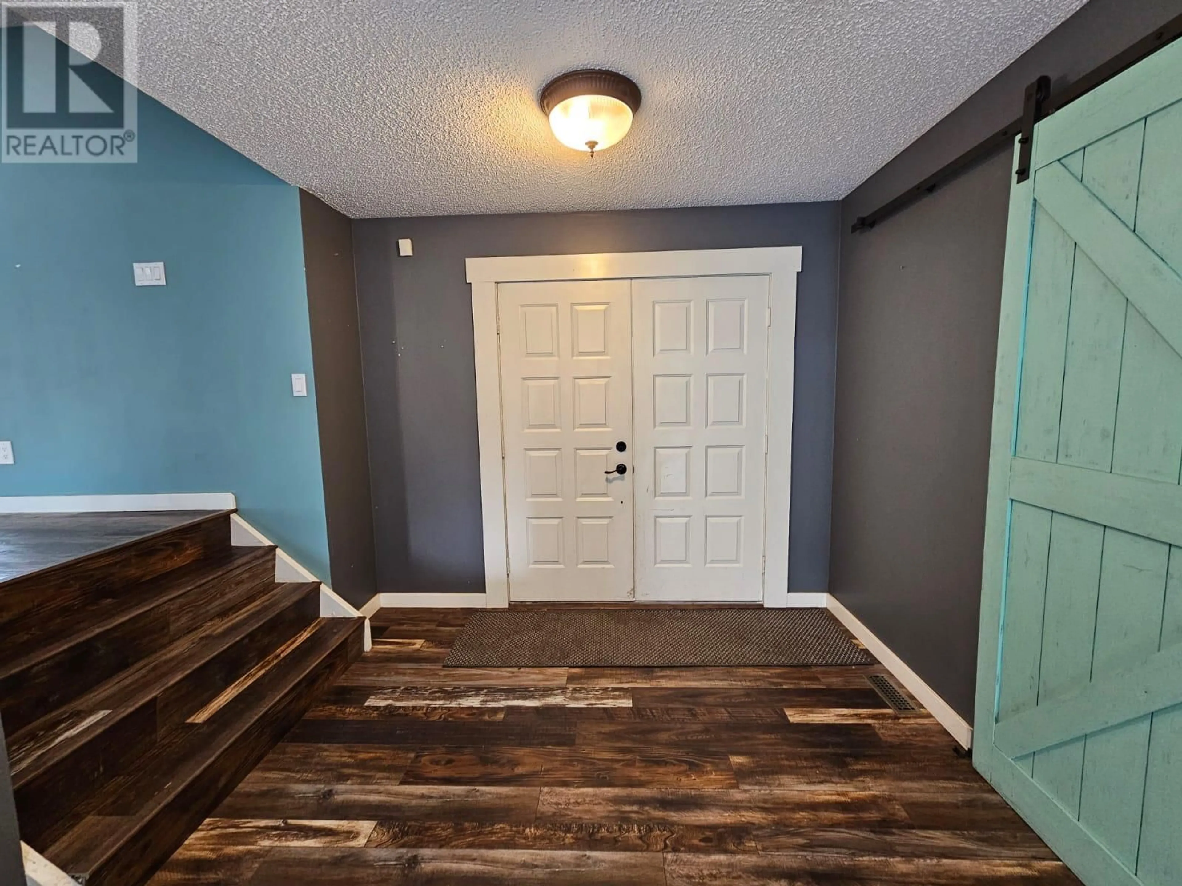 Indoor entryway, wood floors for 3431 SPRUCE Road, Chetwynd British Columbia V0C1J0