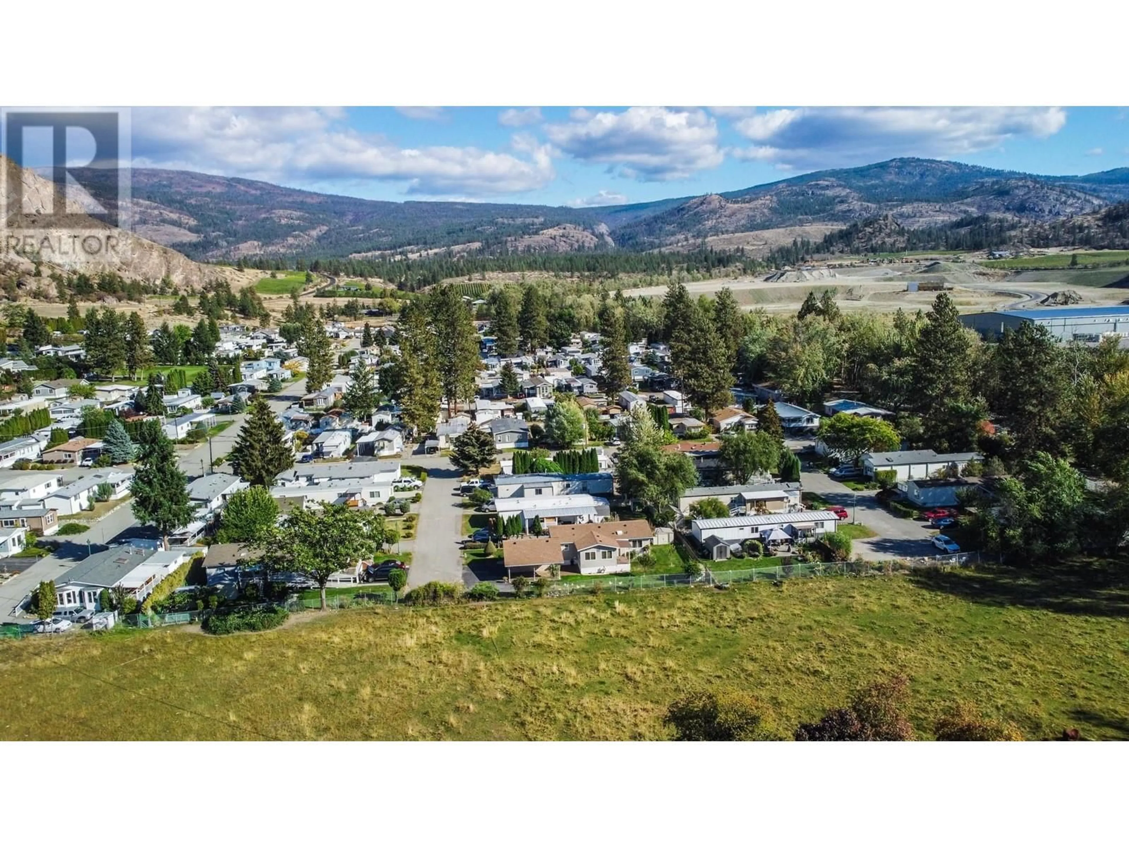 A pic from outside/outdoor area/front of a property/back of a property/a pic from drone, mountain view for L2 - 4505 MCLEAN CREEK ROAD, Okanagan Falls British Columbia V0H1R1