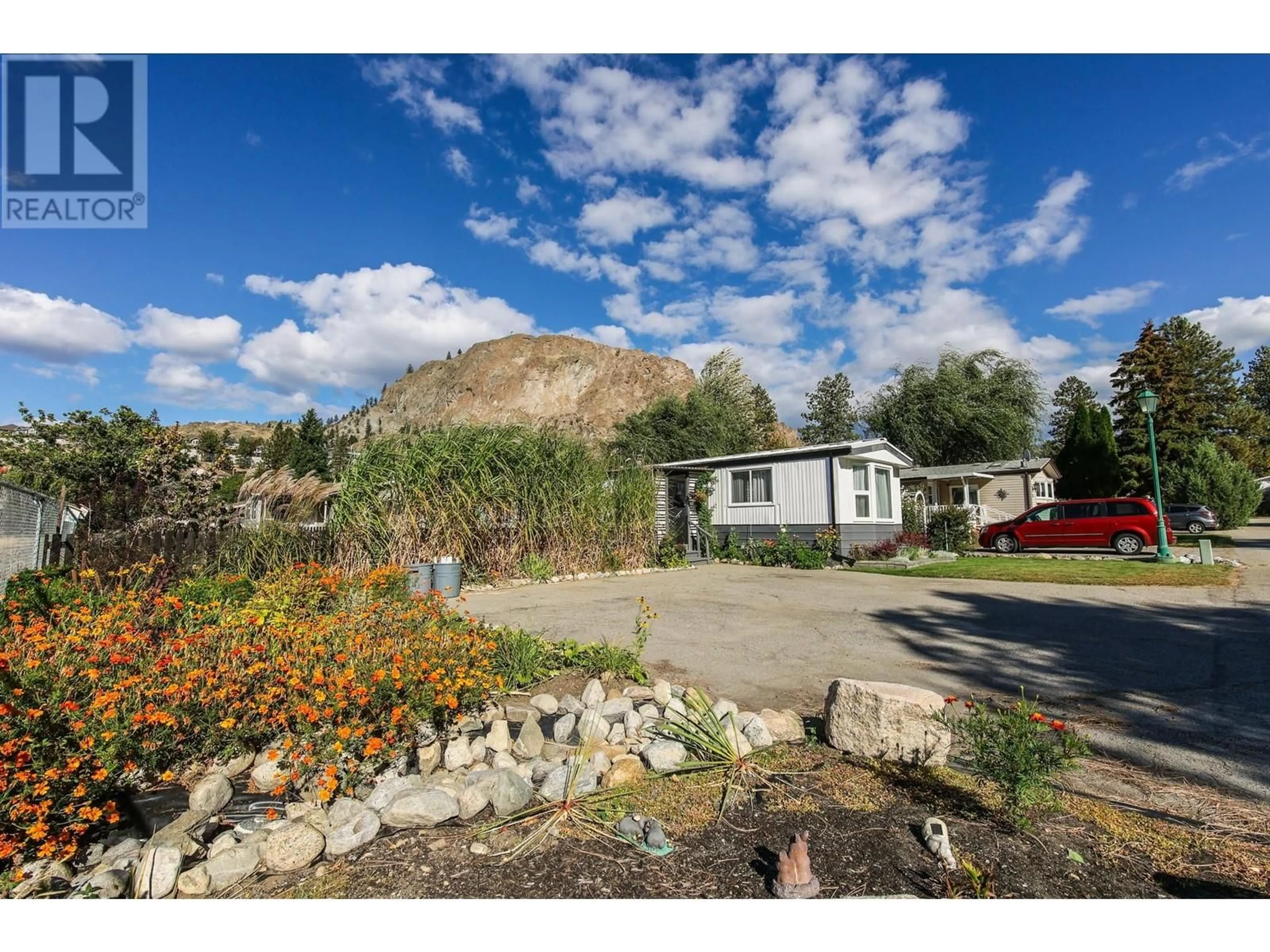 A pic from outside/outdoor area/front of a property/back of a property/a pic from drone, mountain view for 4505 McLean Creek Road Unit# L2, Okanagan Falls British Columbia V0H1R1