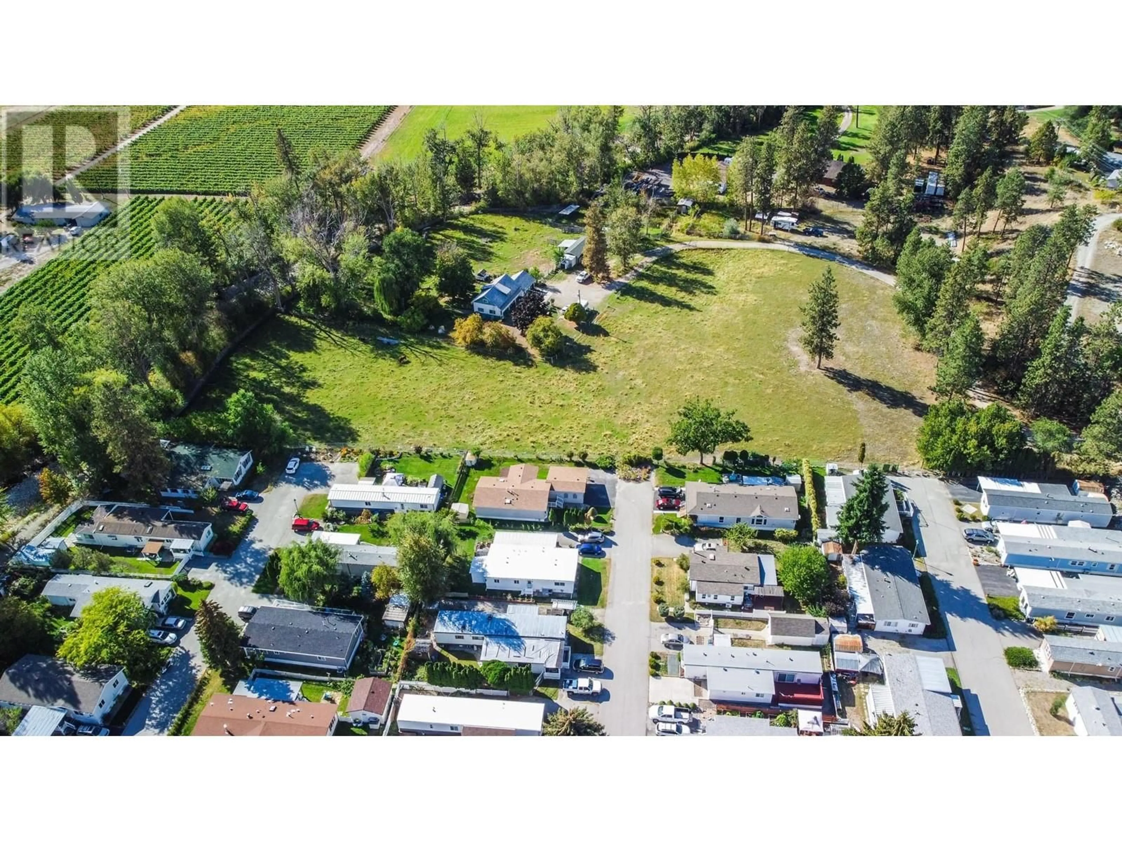 A pic from outside/outdoor area/front of a property/back of a property/a pic from drone, street for 4505 McLean Creek Road Unit# L2, Okanagan Falls British Columbia V0H1R1