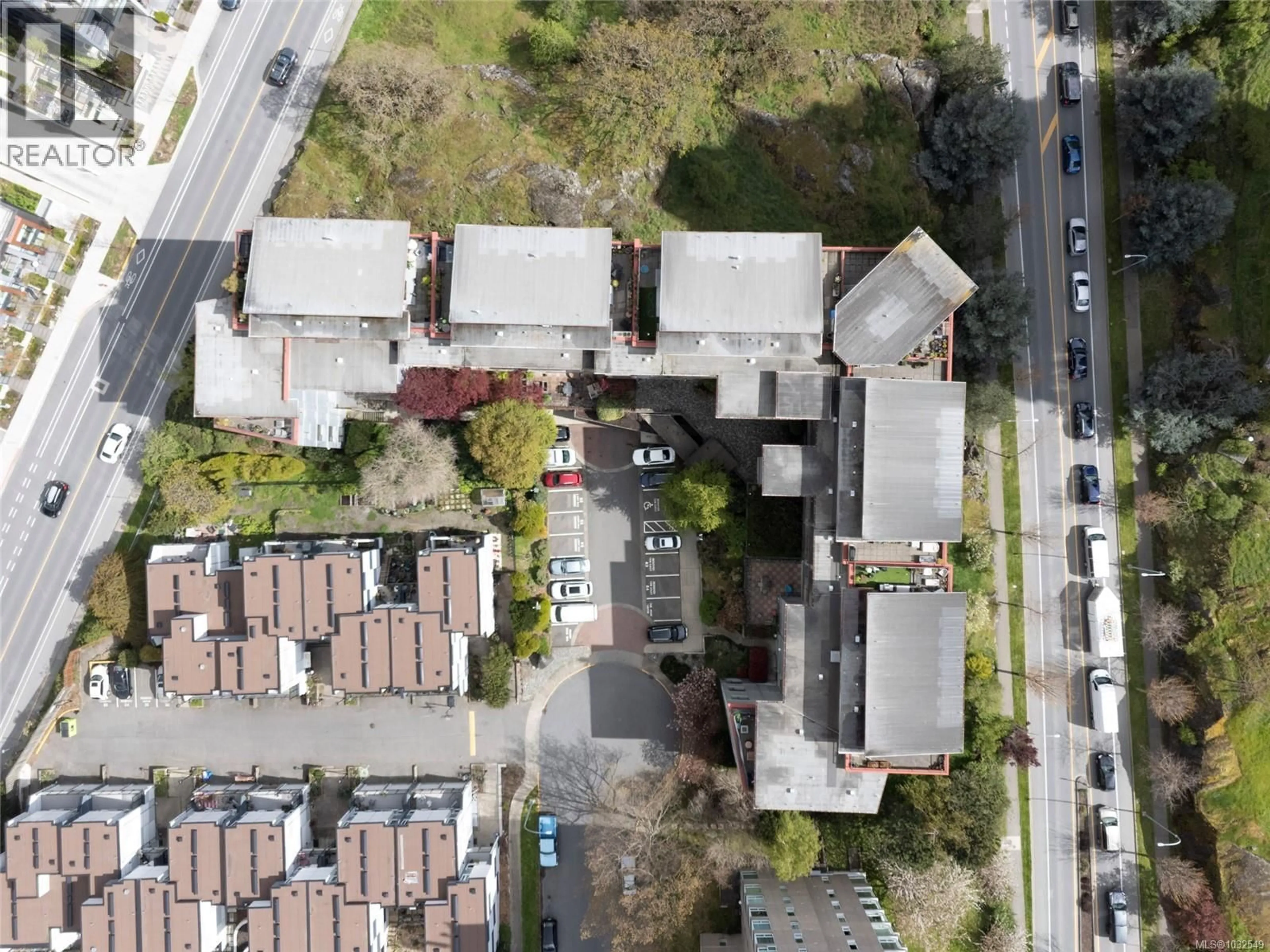 A pic from outside/outdoor area/front of a property/back of a property/a pic from drone, street for 210 - 455 SITKUM ROAD, Victoria British Columbia V9A7N9