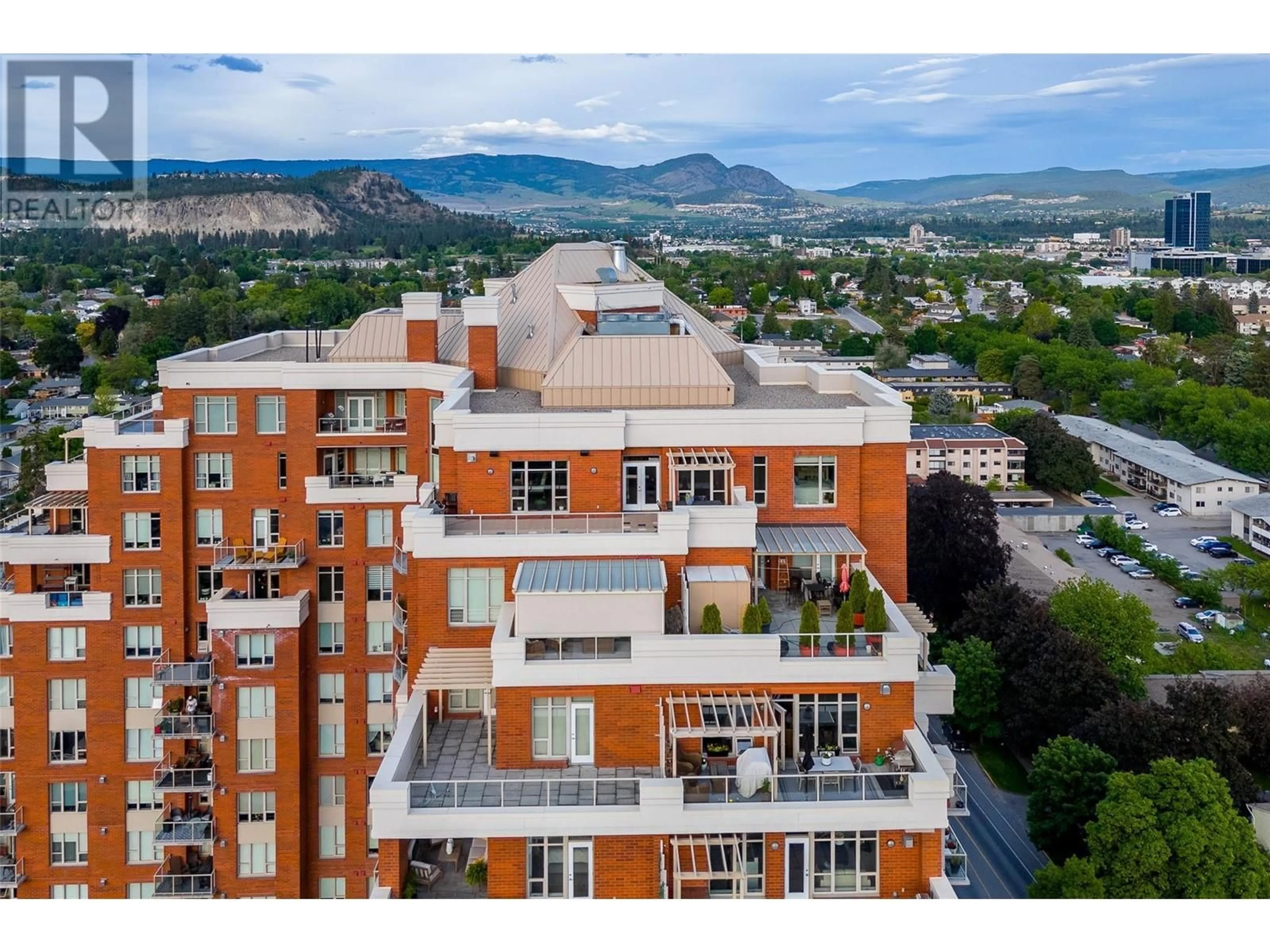 A pic from exterior of the house or condo, the view of city buildings for 1160 Bernard Avenue Unit# 1702, Kelowna British Columbia V1Y6R2