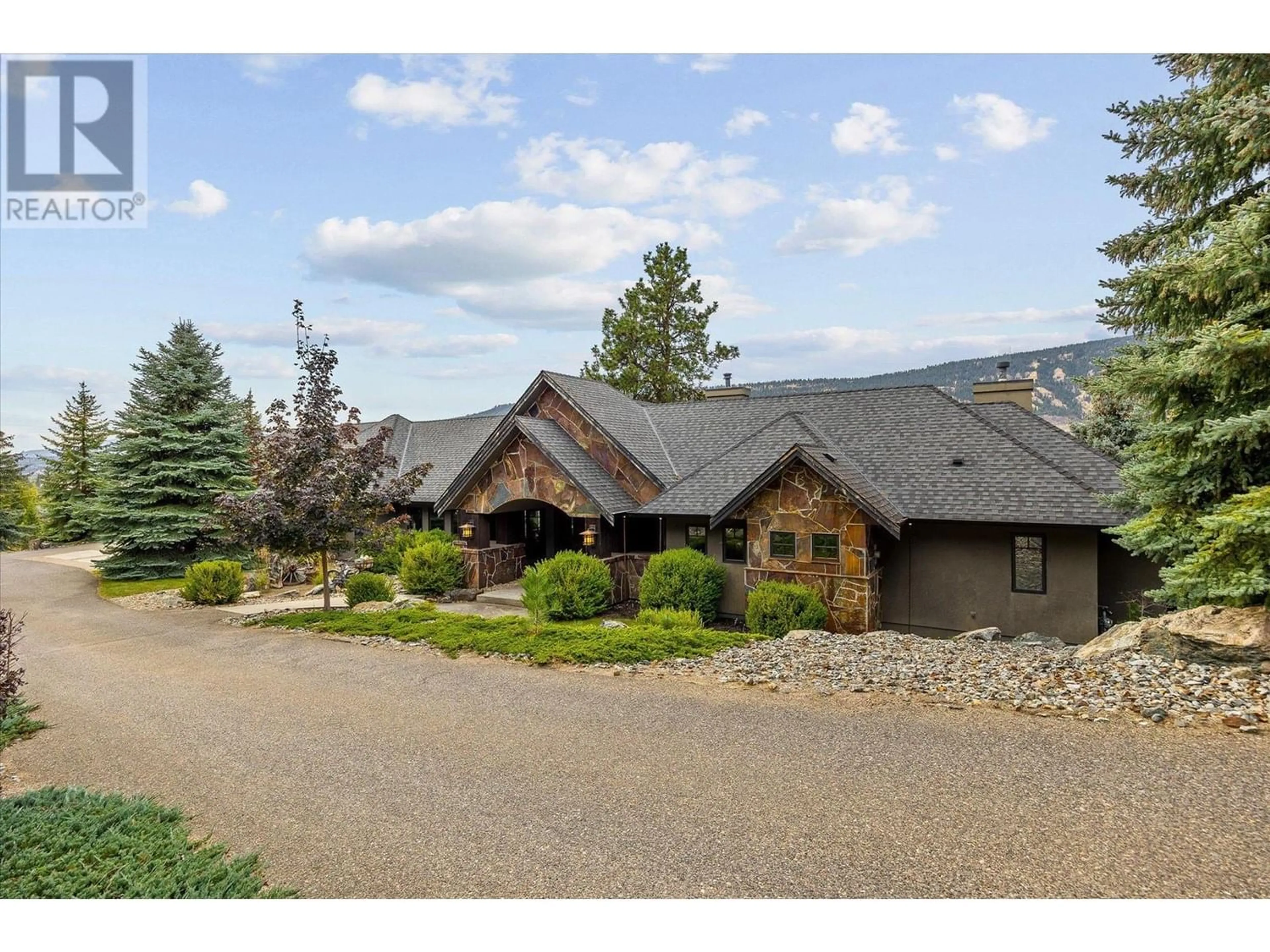 A pic from outside/outdoor area/front of a property/back of a property/a pic from drone, mountain view for 15026 OYAMA ROAD, Lake Country British Columbia V4V2C6
