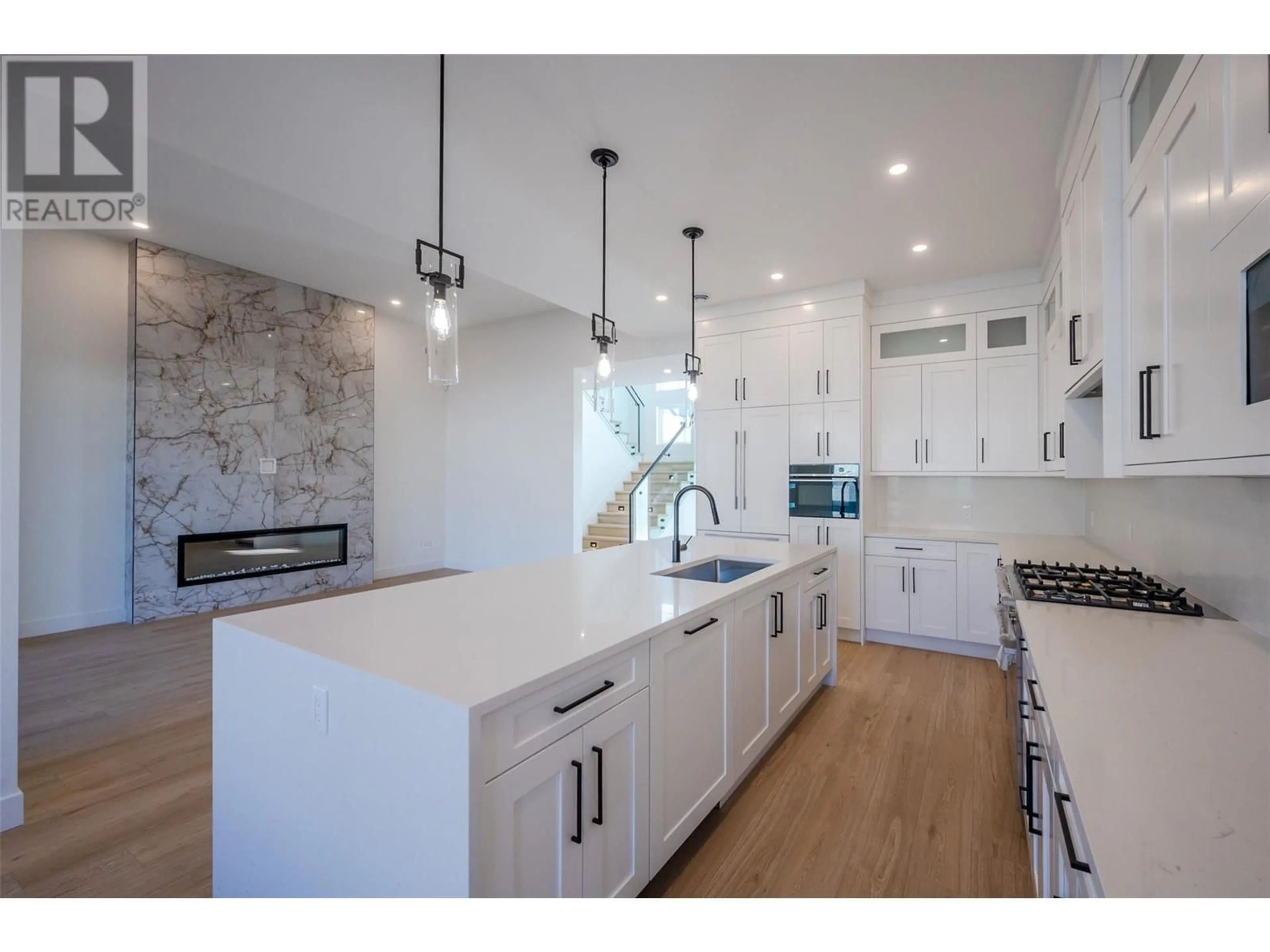 Open concept kitchen for 1125 Antler Drive, Penticton British Columbia V2A9G6