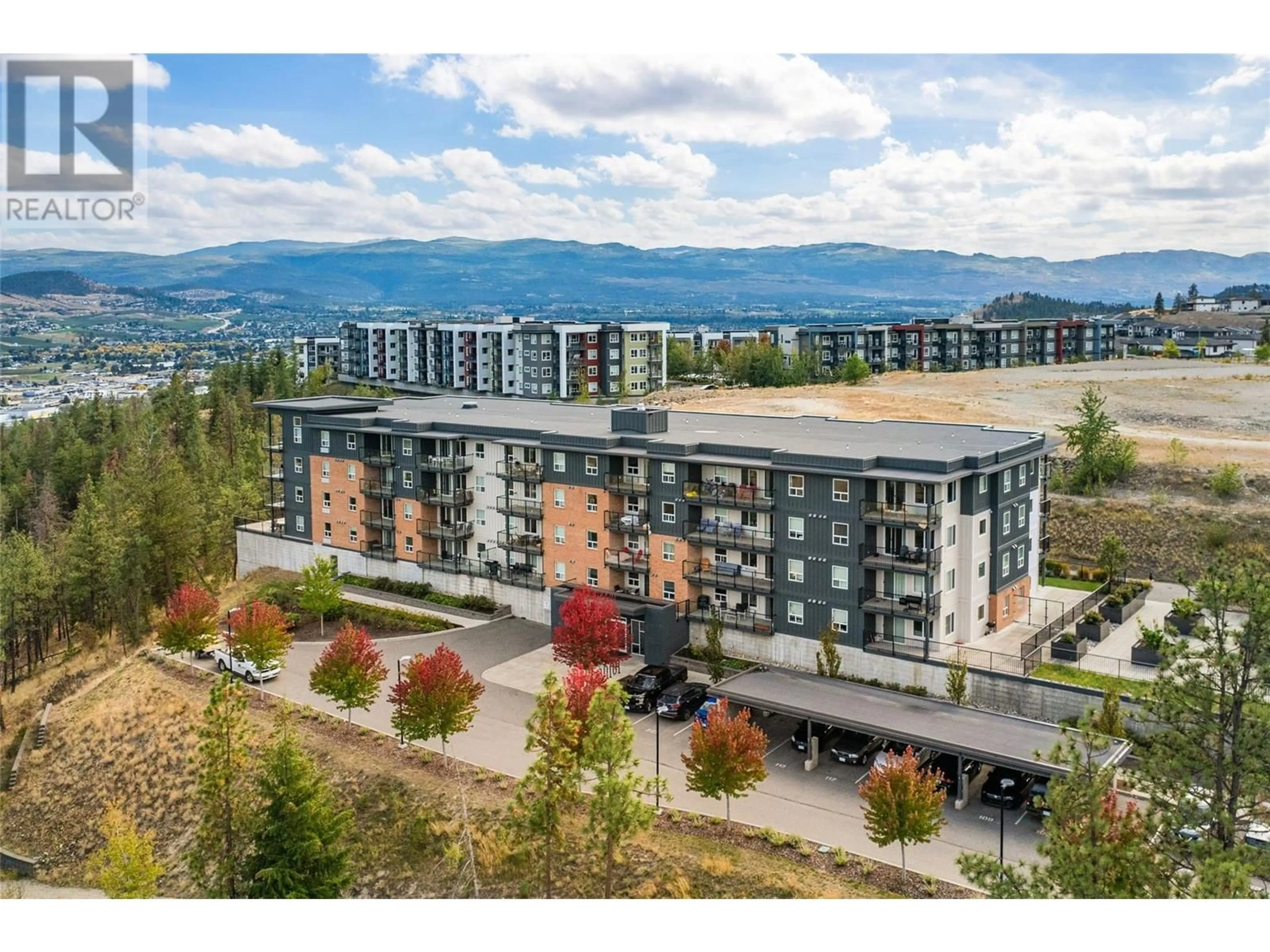 A pic from exterior of the house or condo, mountain for 883 Academy Way Unit# PH3, Kelowna British Columbia V1V0A3