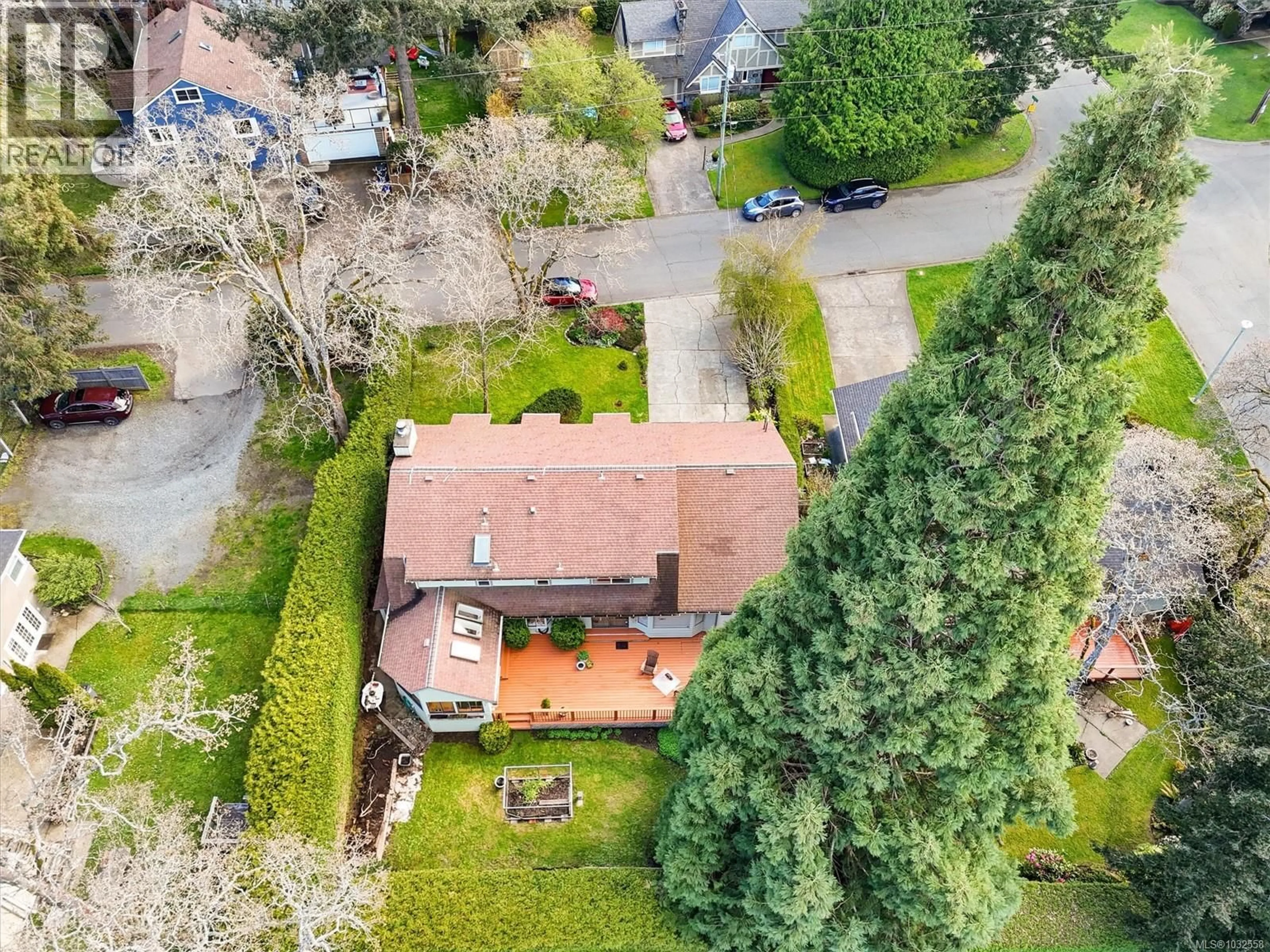 A pic from outside/outdoor area/front of a property/back of a property/a pic from drone, street for 1538 CEDARGLEN ROAD, Saanich British Columbia V8N2A9