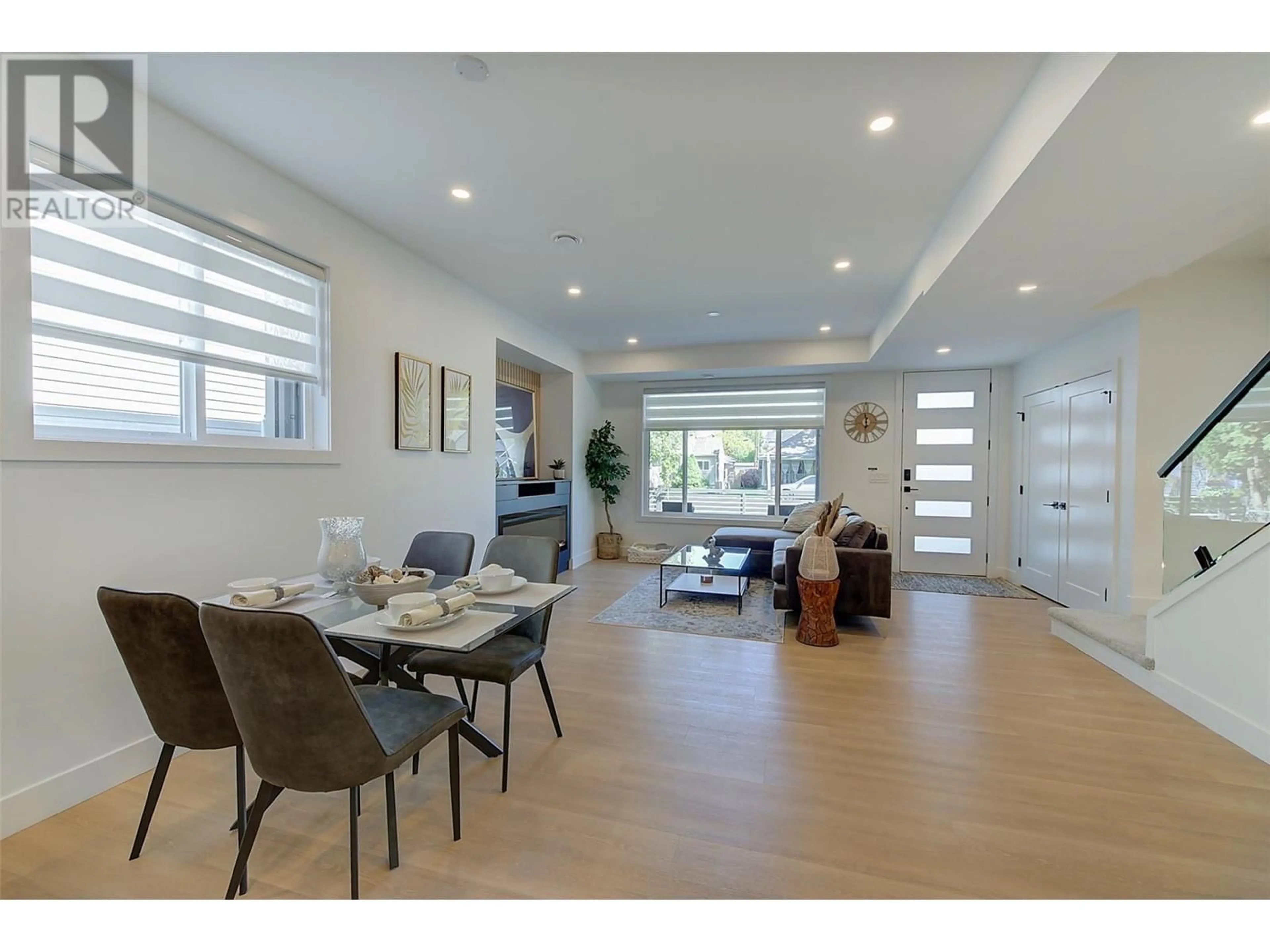 A pic of a room, wood floors for 787 Lawson Avenue Unit# 1, Kelowna British Columbia V1Y6S9