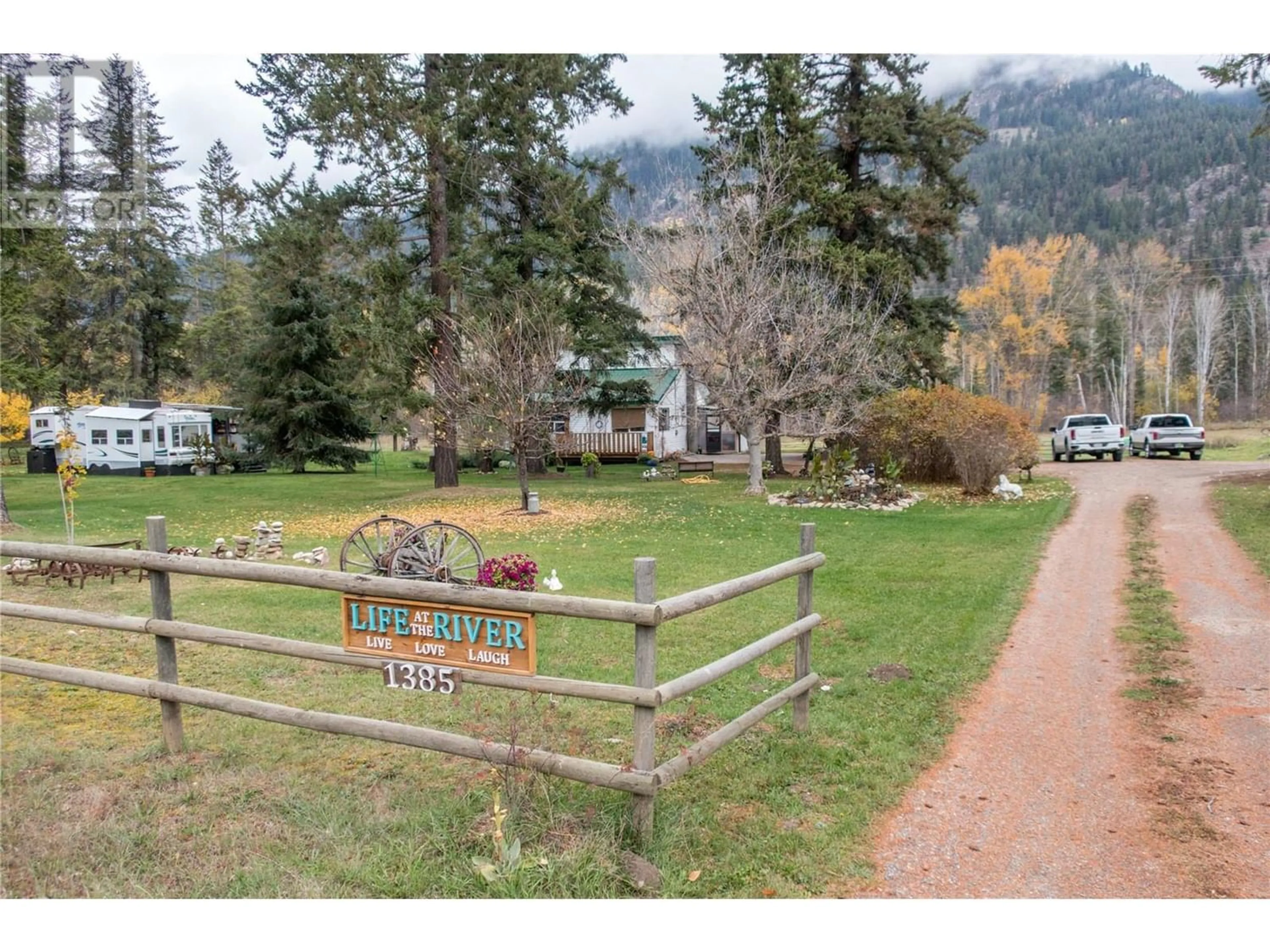A pic from outside/outdoor area/front of a property/back of a property/a pic from drone, mountain view for 1385 6 HIGHWAY, Cherryville British Columbia V0E2G1