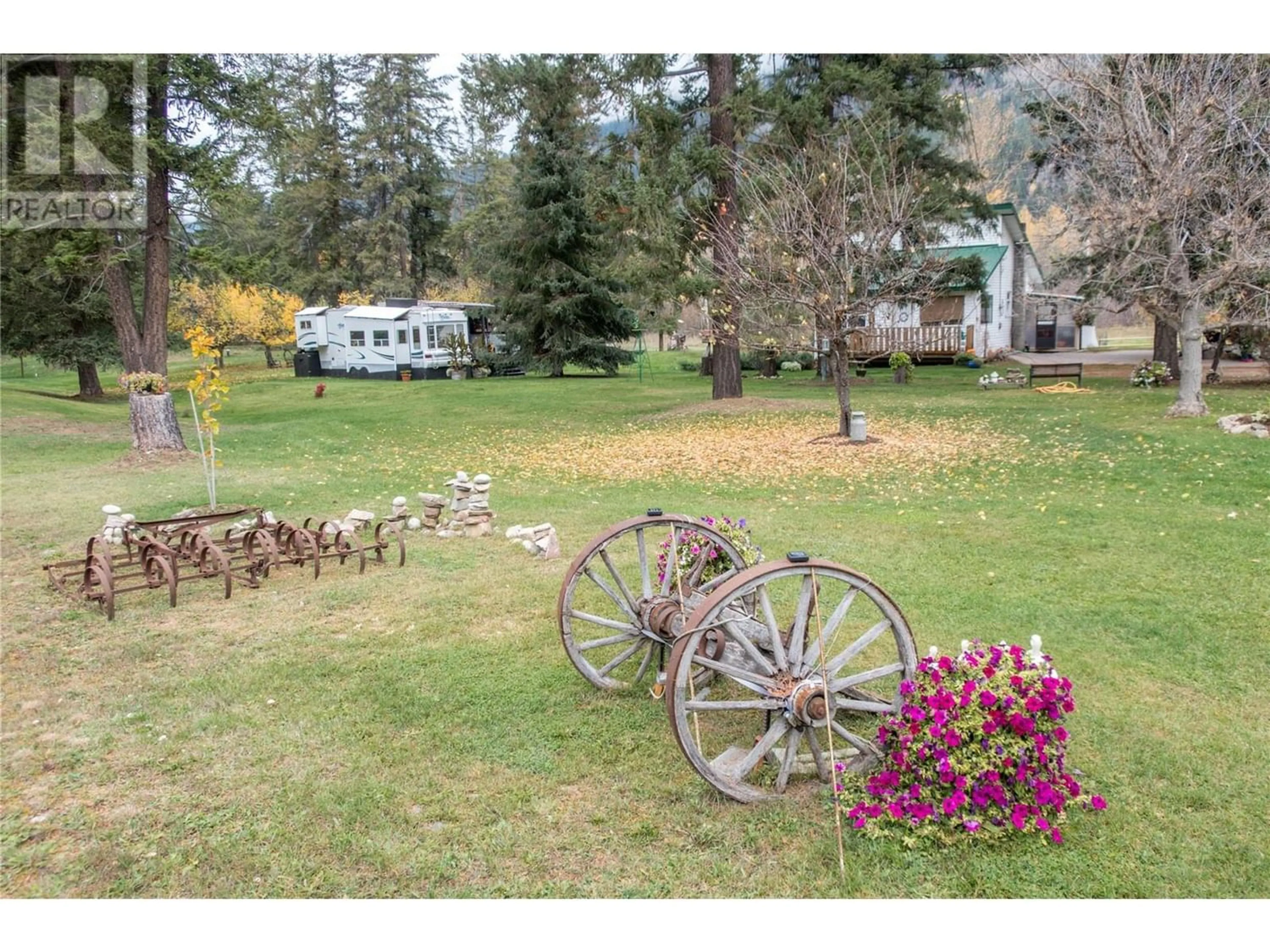 A pic from outside/outdoor area/front of a property/back of a property/a pic from drone, mountain view for 1385 6 HIGHWAY, Cherryville British Columbia V0E2G1