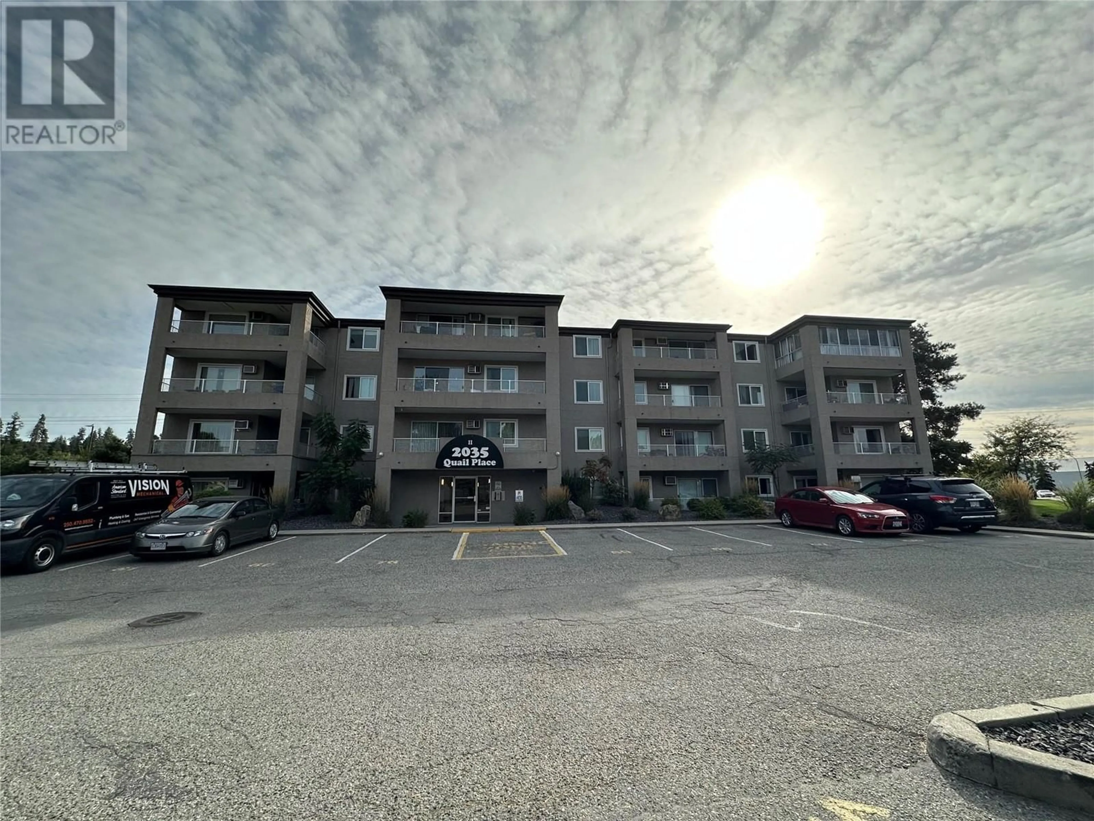 A pic from exterior of the house or condo, the street view for 2035 Baron Road Unit# 401, Kelowna British Columbia V1X7G3