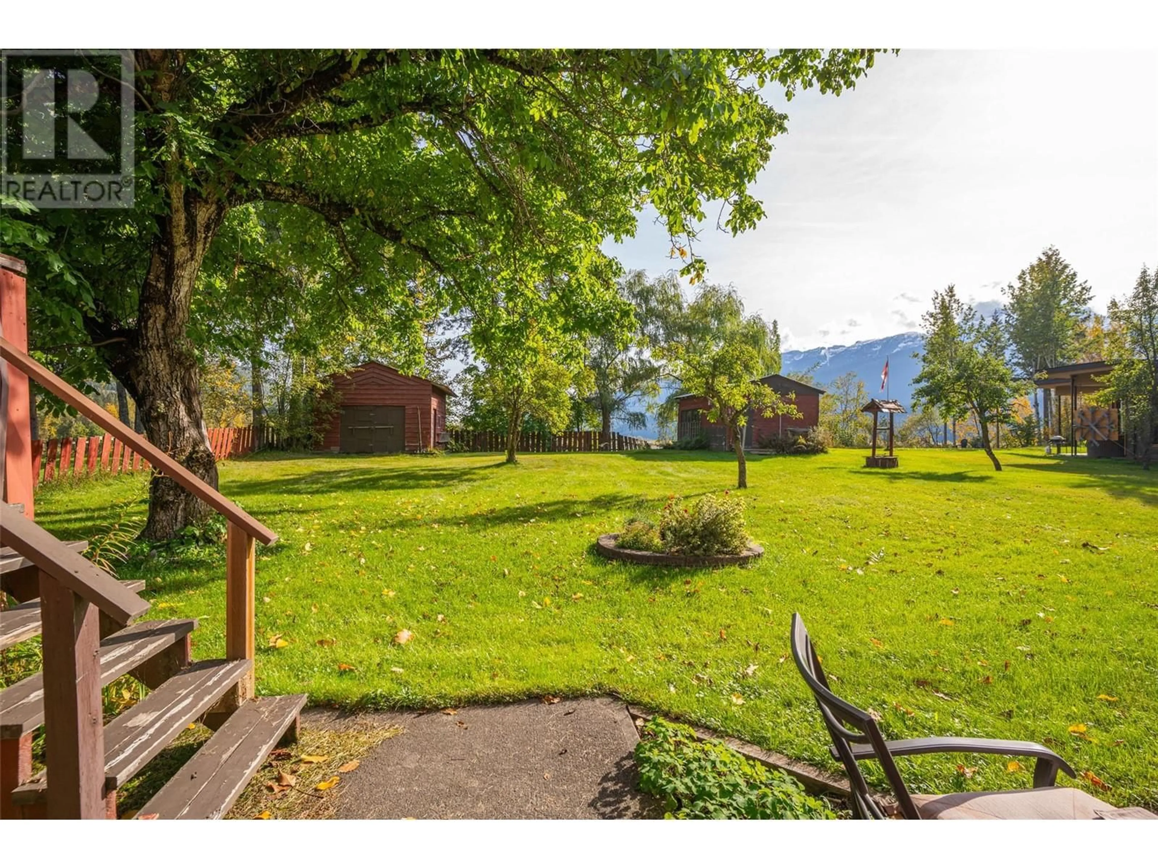 Patio, the fenced backyard for 2281 Airport Way, Revelstoke British Columbia V0E2S3