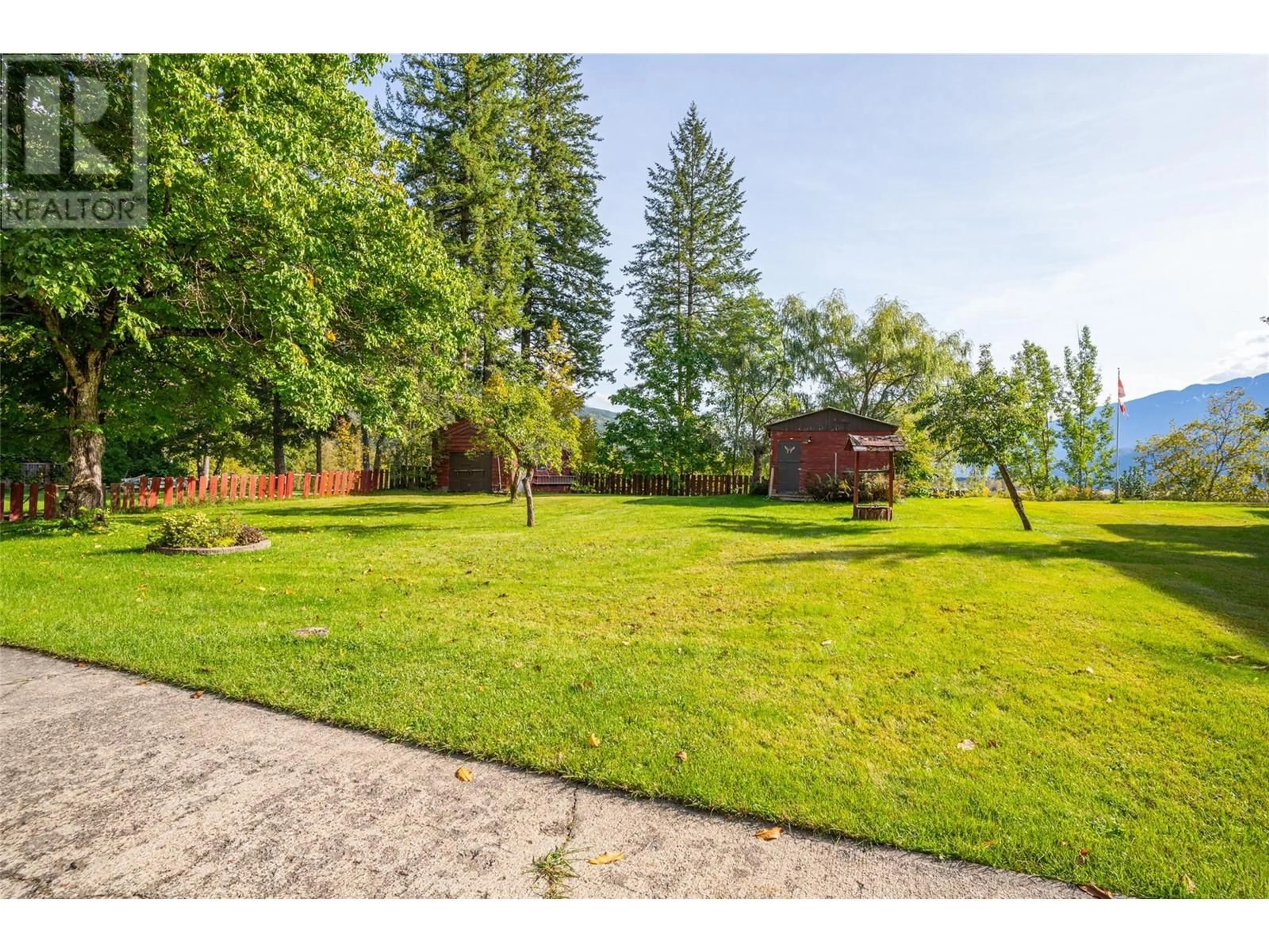 Patio, the fenced backyard for 2281 Airport Way, Revelstoke British Columbia V0E2S3