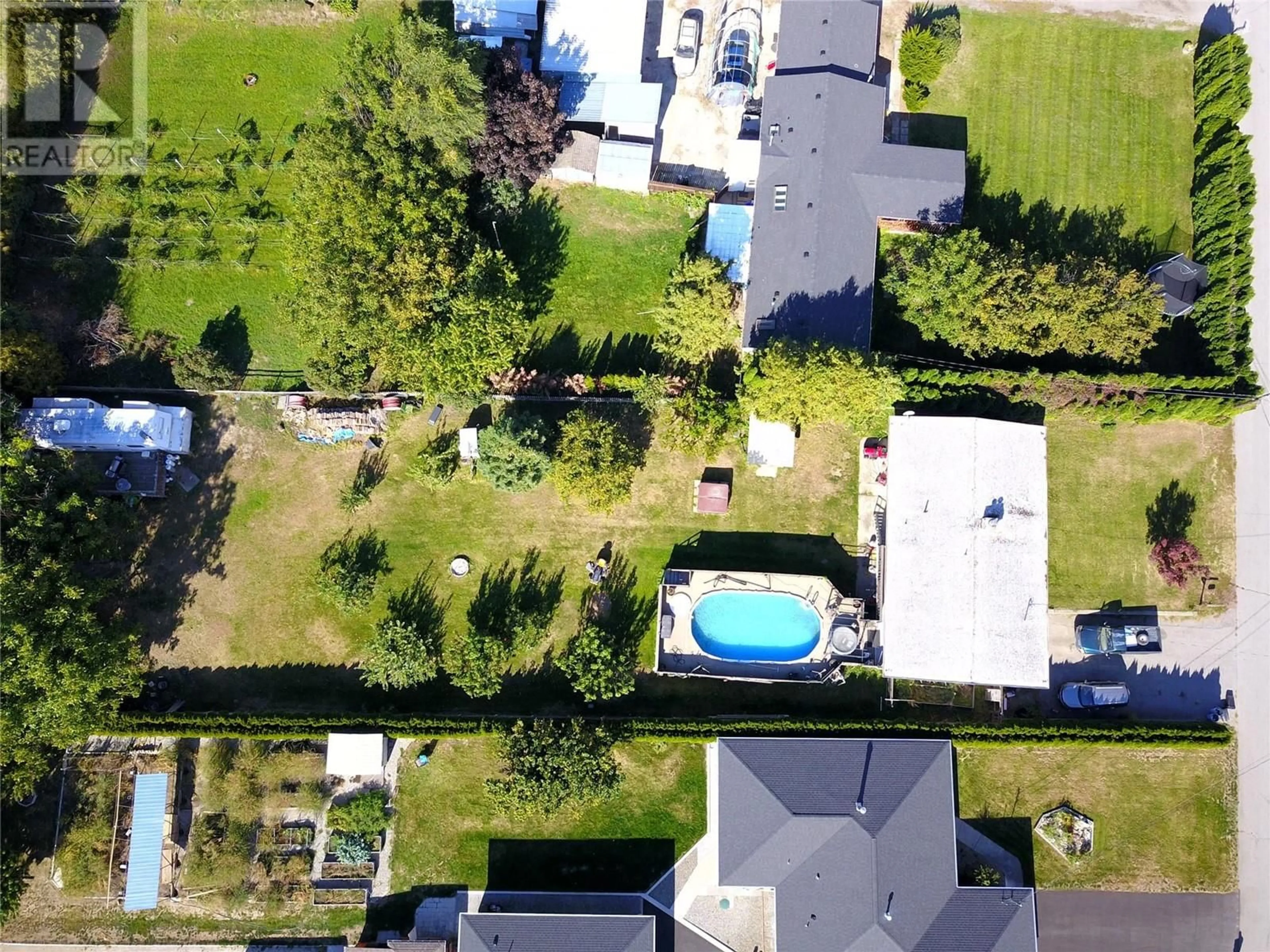 Frontside or backside of a home, the fenced backyard for 5246 HAYNES Road, Oliver British Columbia V0H1T1