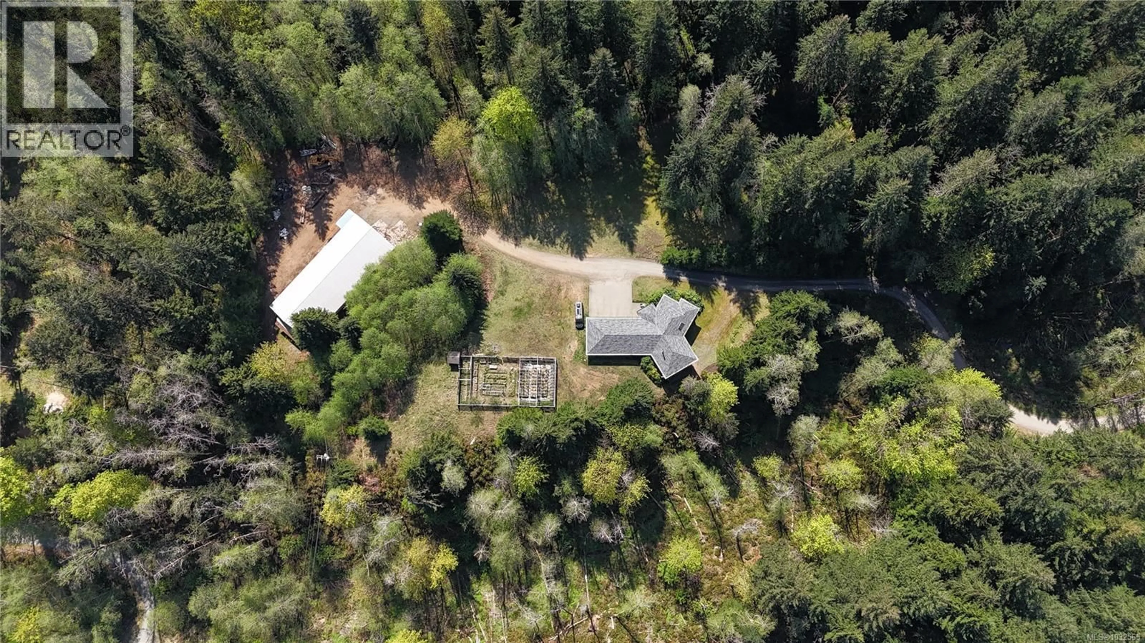A pic from outside/outdoor area/front of a property/back of a property/a pic from drone, forest/trees view for 4901 ARGONAUT ROAD, Campbell River British Columbia V9H1P3
