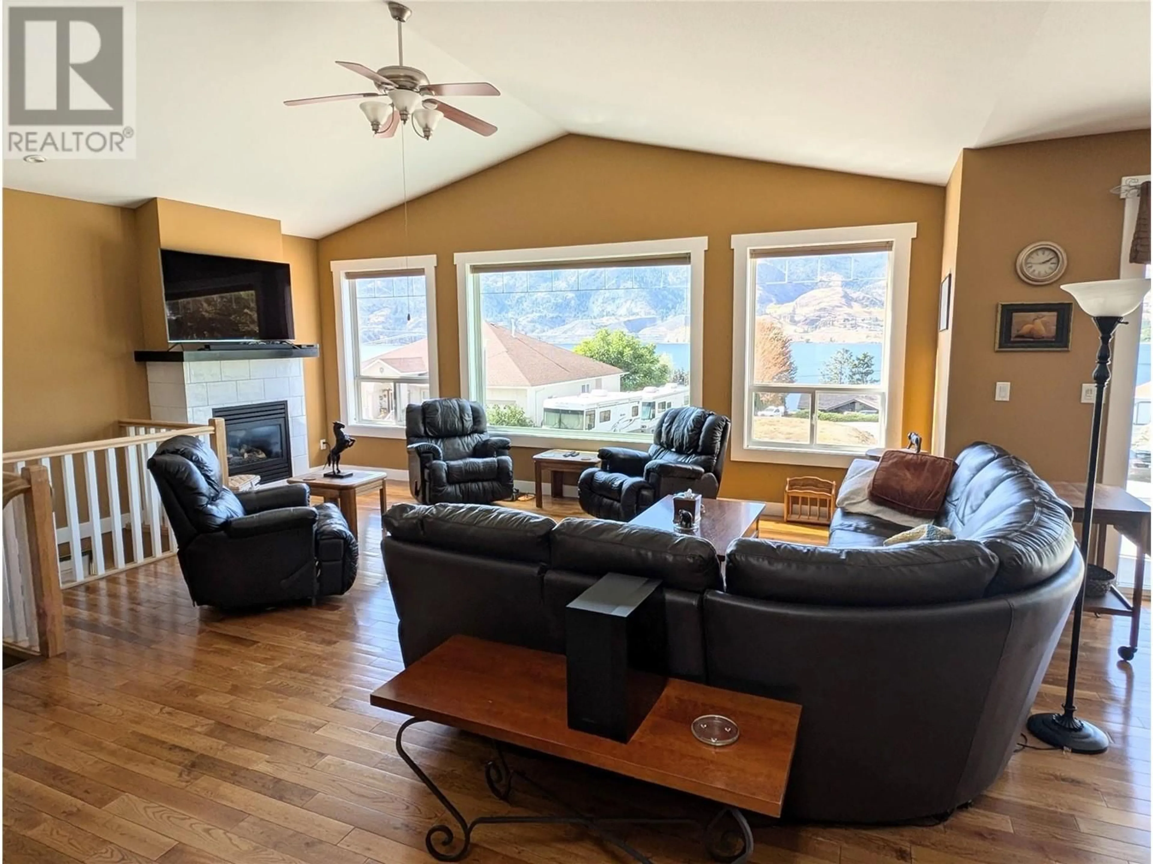 Living room with furniture, wood/laminate floor for 4000 FINNERTY ROAD, Penticton British Columbia V2A8W2