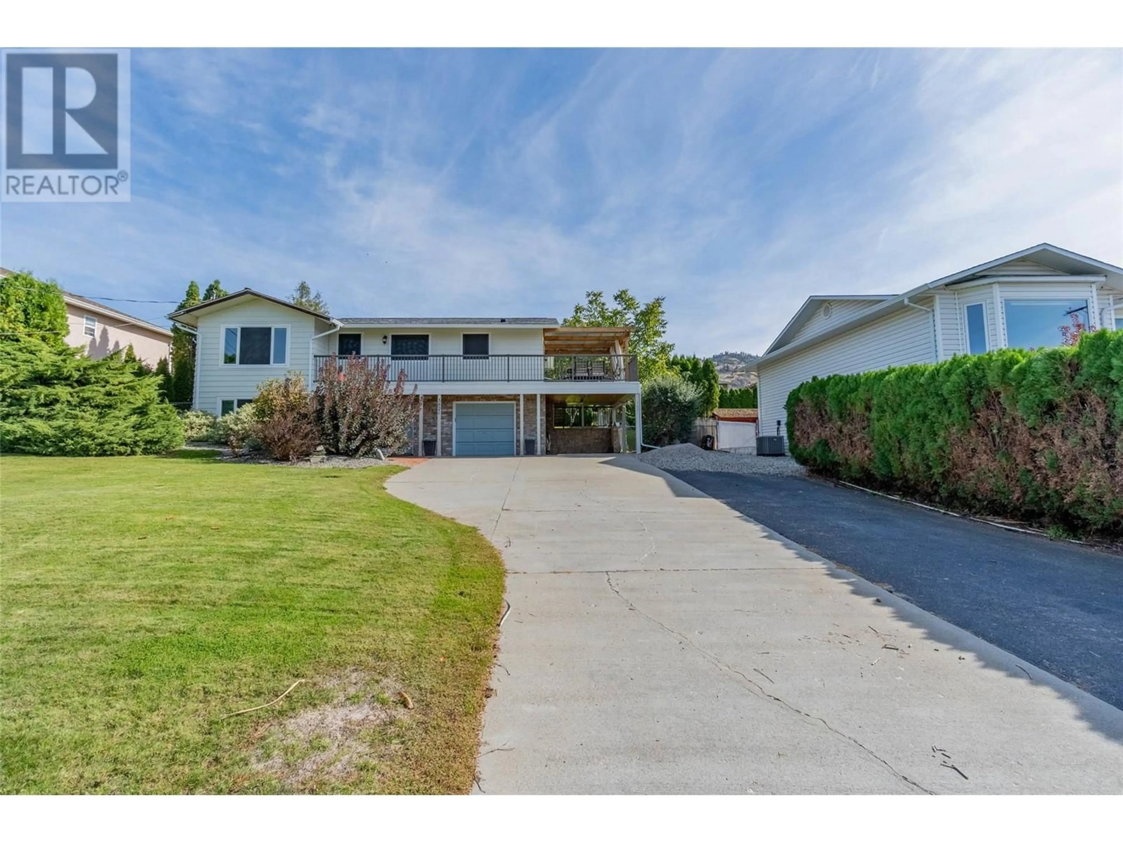 Frontside or backside of a home, the street view for 3821 35TH Street, Osoyoos British Columbia V0H1V6