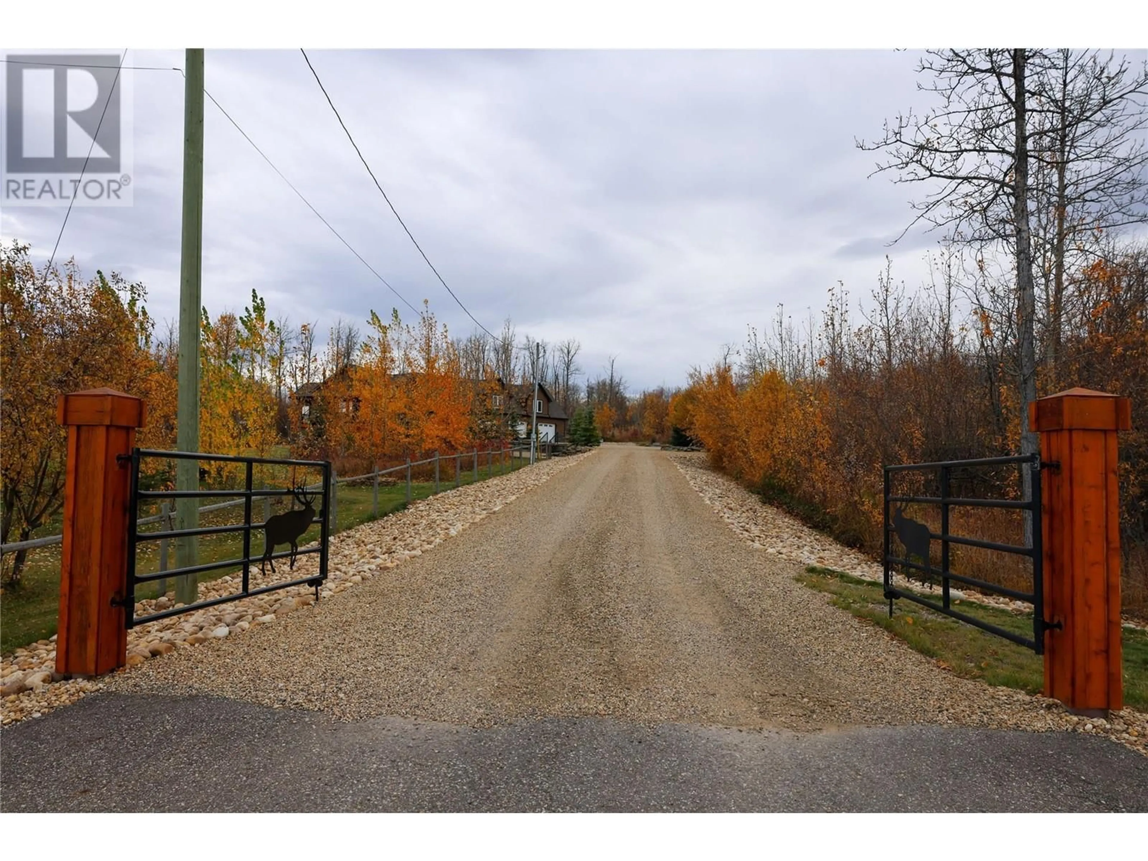 A pic from exterior of the house or condo, the street view for 13368 Elk Ridge Trail, Dawson Creek British Columbia V1G4H4