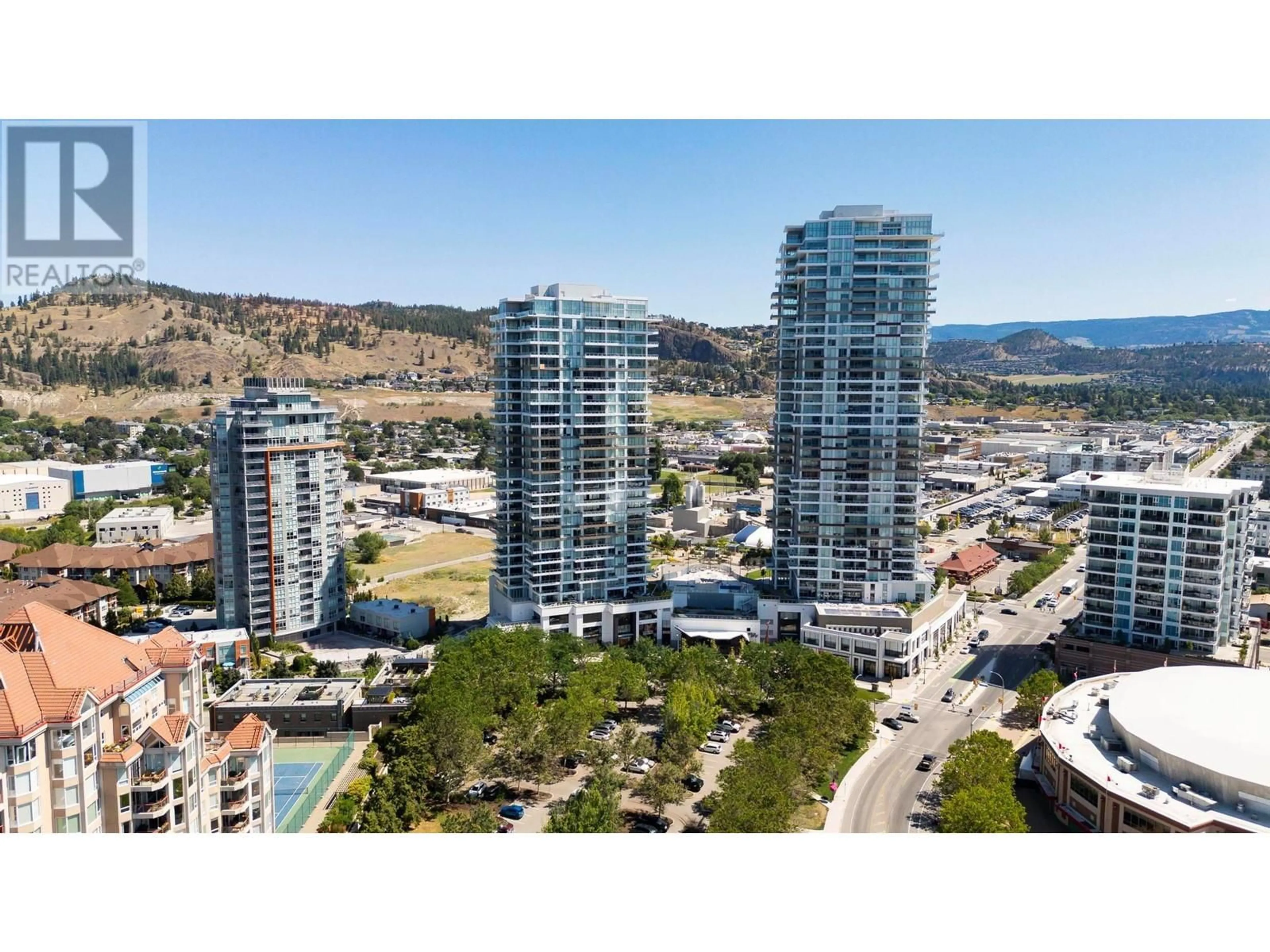 A pic from exterior of the house or condo, the view of city buildings for 1181 SUNSET Drive Unit# 1306, Kelowna British Columbia V1Y0L4